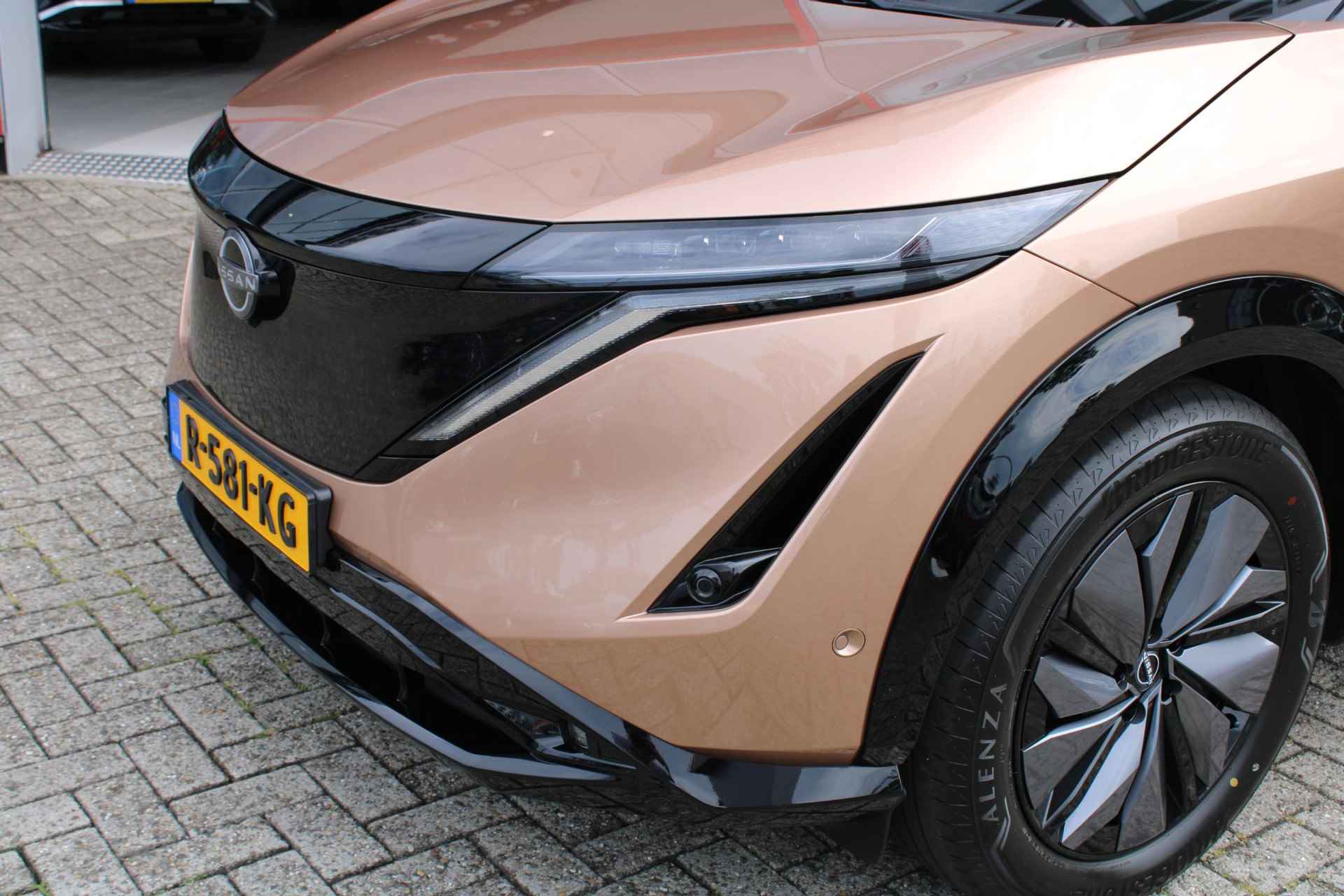 Nissan Ariya Evolve 91 kWh AUTOMAAT 255PK | SEPP subsidie €2.000,- | 1ste eigenaar | Navigatie, Apple Carplay en Android Auto | Adaptive Cruise Control | Climate Control | Leder/alcantara interieur | 360 camera | Parkeersensoren voor en achter | Schuif- kanteldak | - 6/60