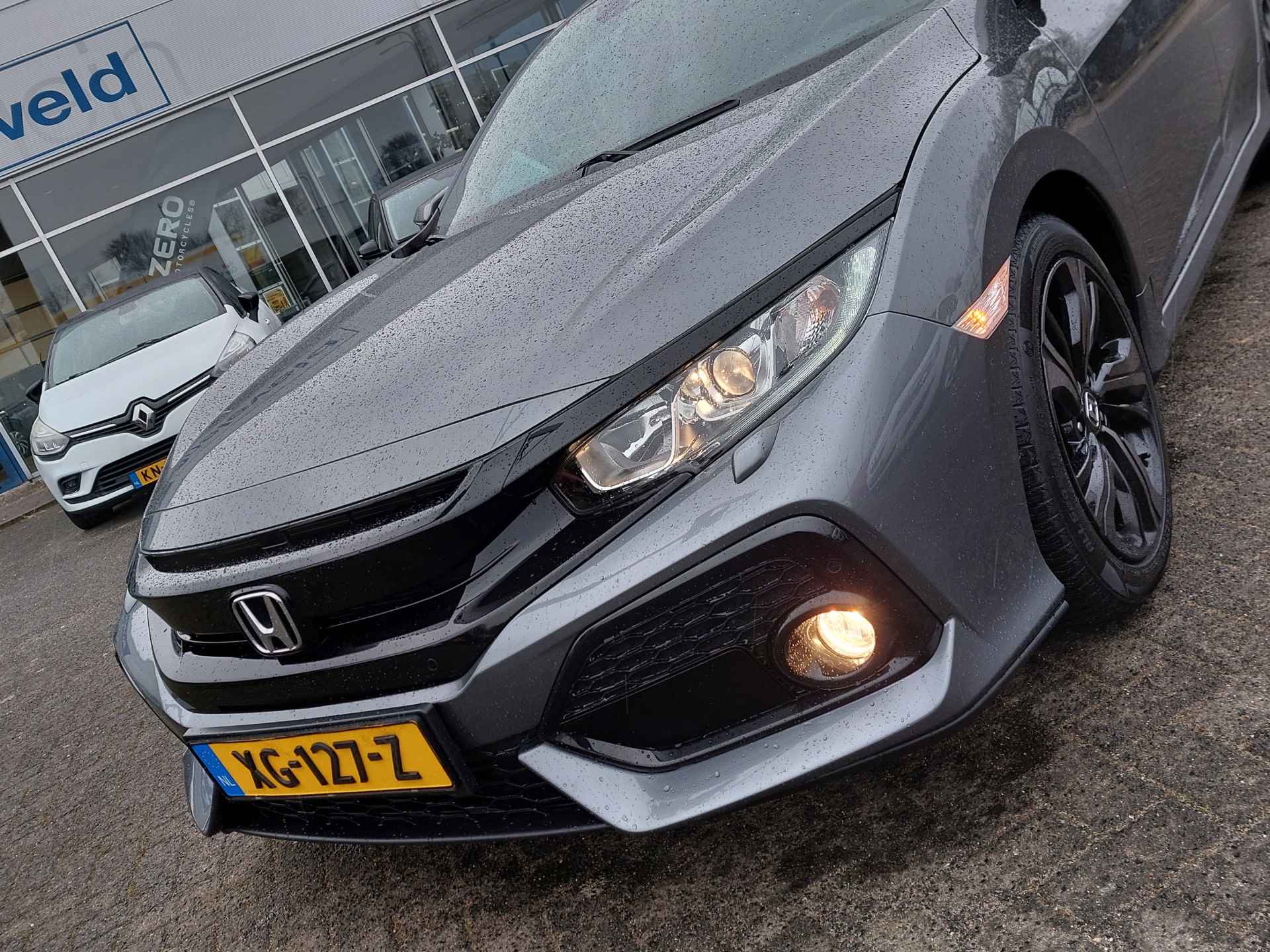 Honda Civic 1.0 i-VTEC 126pk Automaat Elegance | Navi | Apple Carplay+Android Auto | Clima | Adap.Cruise | Pdc V+A+Camera | Rijstrook+Licht+Regensensor | Mistlampen | Privacy Glass | 17''lm - 29/38