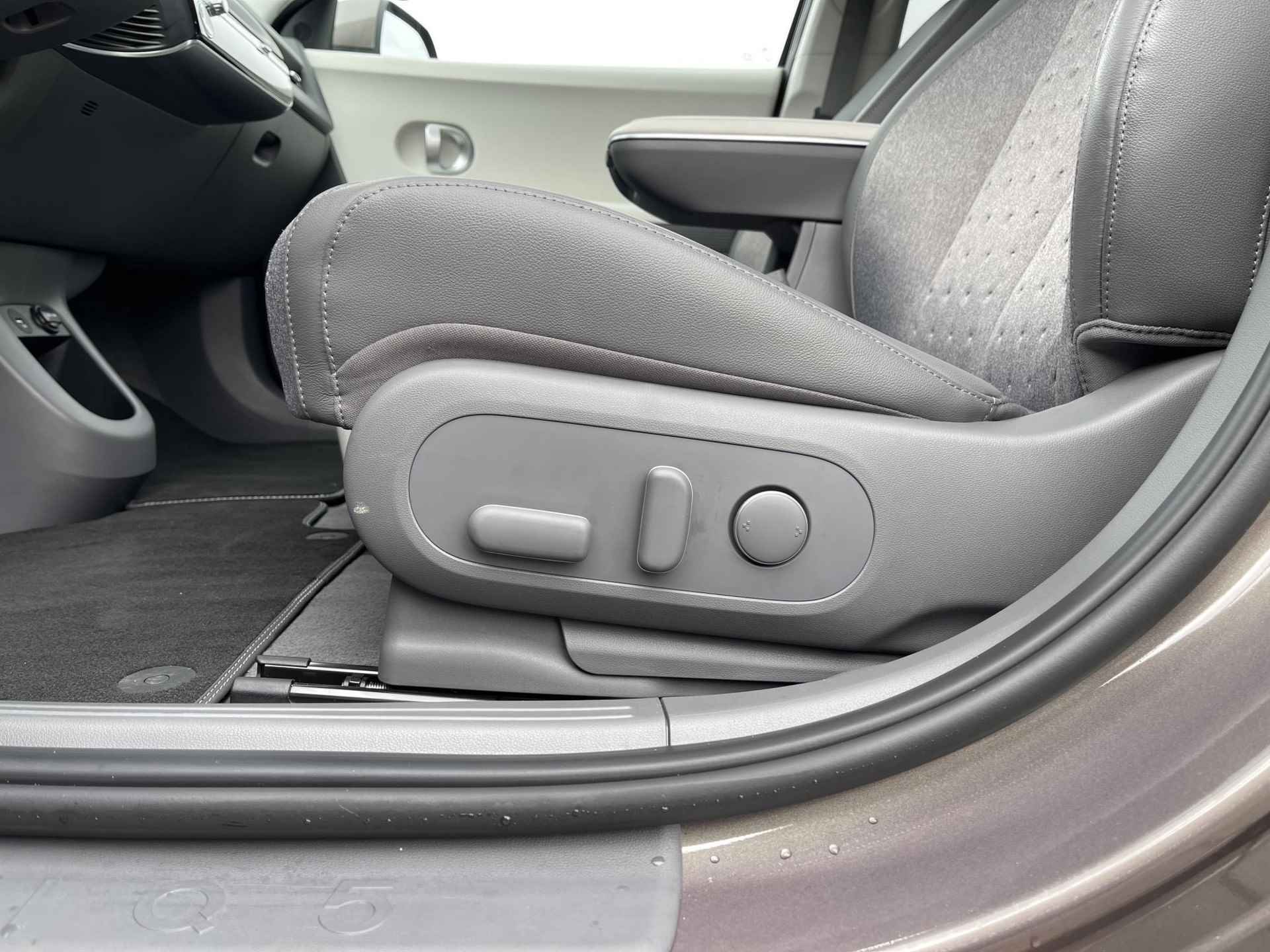 Hyundai IONIQ 5 77 kWh Connect Option Pack | Warmtepomp | Stuur- + Stoelverwarming | Adapt. Cruise Control | Apple Carplay/Android Auto | BOSE Audio | Rijklaarprijs! - 23/24