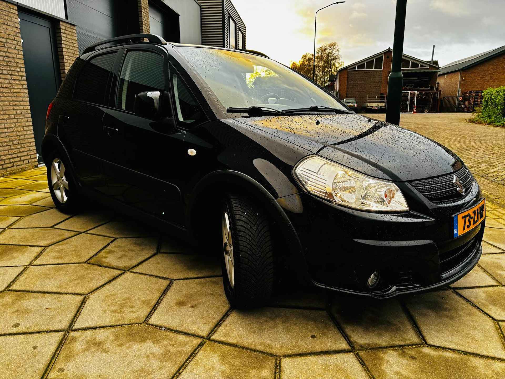 Suzuki SX4 AIRCO|Trekhaak afnb|Privacy glas|Metallic lak| 4 x All-Season Nieuw|Parrot - 4/20