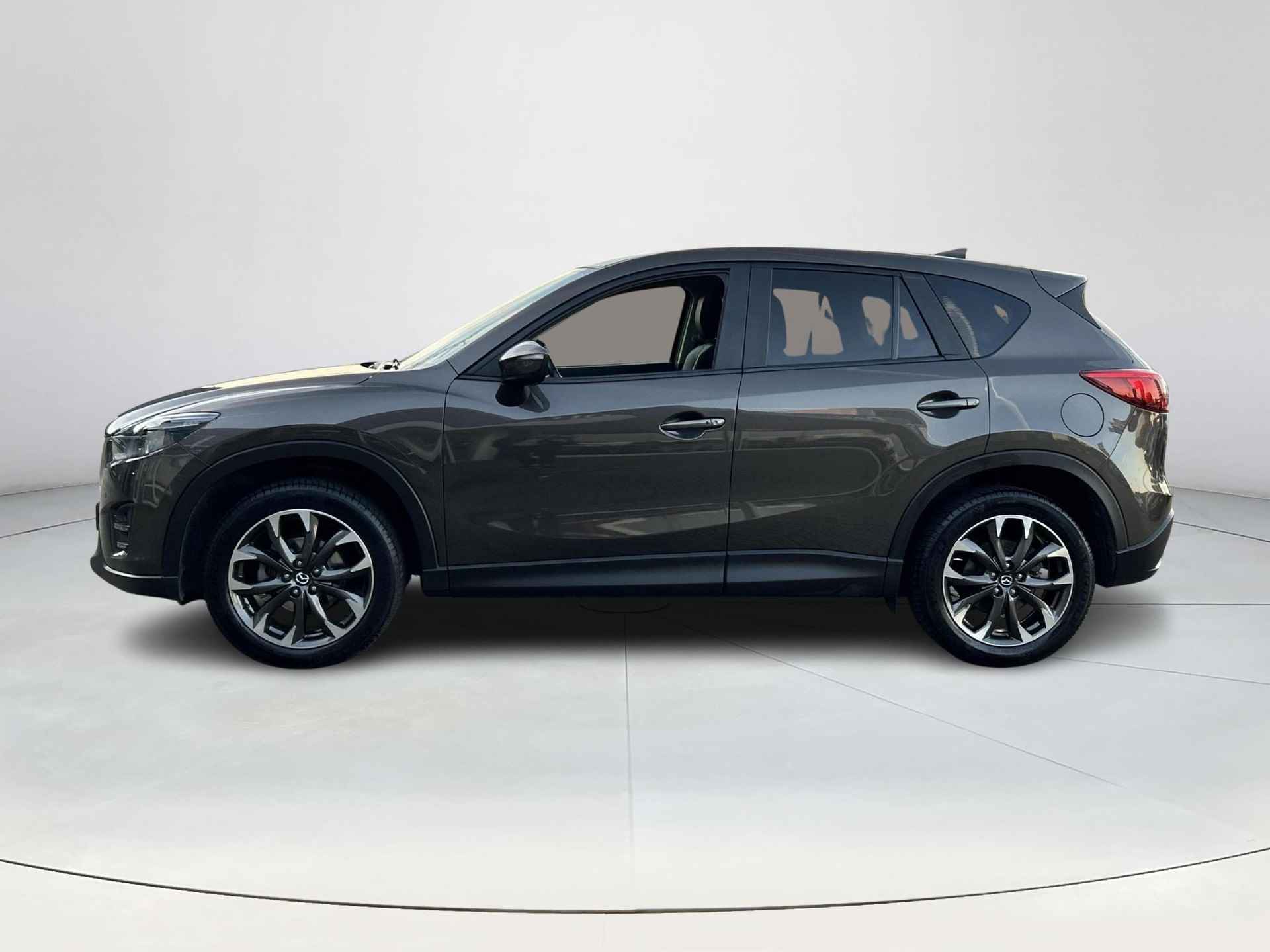 Mazda CX-5 2.0 SkyActiv-G 160 GT-M 4WD Automaat | Rijklaarprijs! | Trekhaak 1.800kg! |  Lage km-stand! | Schuifdak |  Climate Control | Navi | Leder | Stoelverwarming | Elektrische stoelen met geheugen | Inclusief 12 maanden Bovag-garantie! | - 3/28