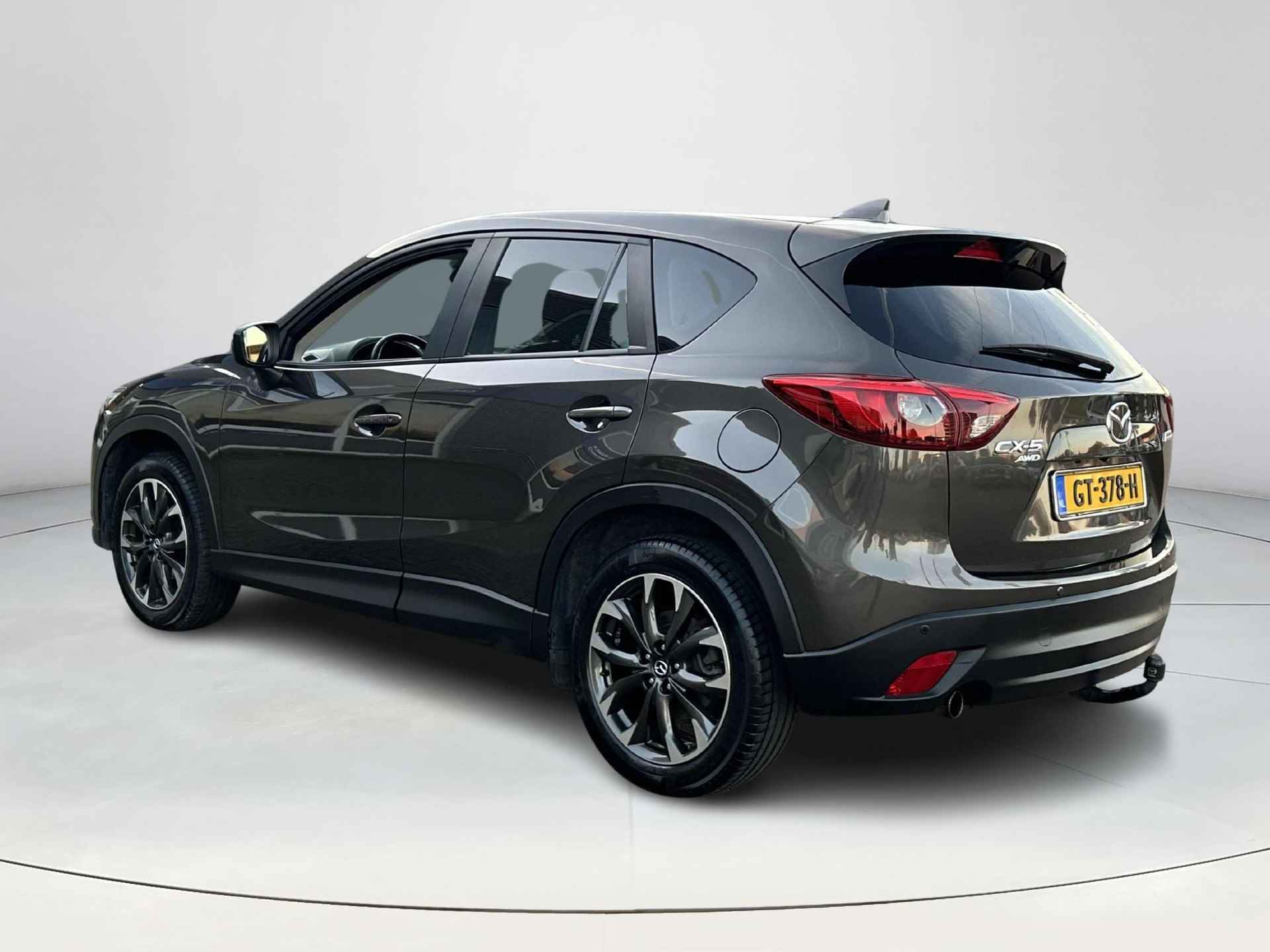 Mazda CX-5 2.0 SkyActiv-G 160 GT-M 4WD Automaat | Rijklaarprijs! | Trekhaak 1.800kg! |  Lage km-stand! | Schuifdak |  Climate Control | Navi | Leder | Stoelverwarming | Elektrische stoelen met geheugen | Inclusief 12 maanden Bovag-garantie! | - 4/28