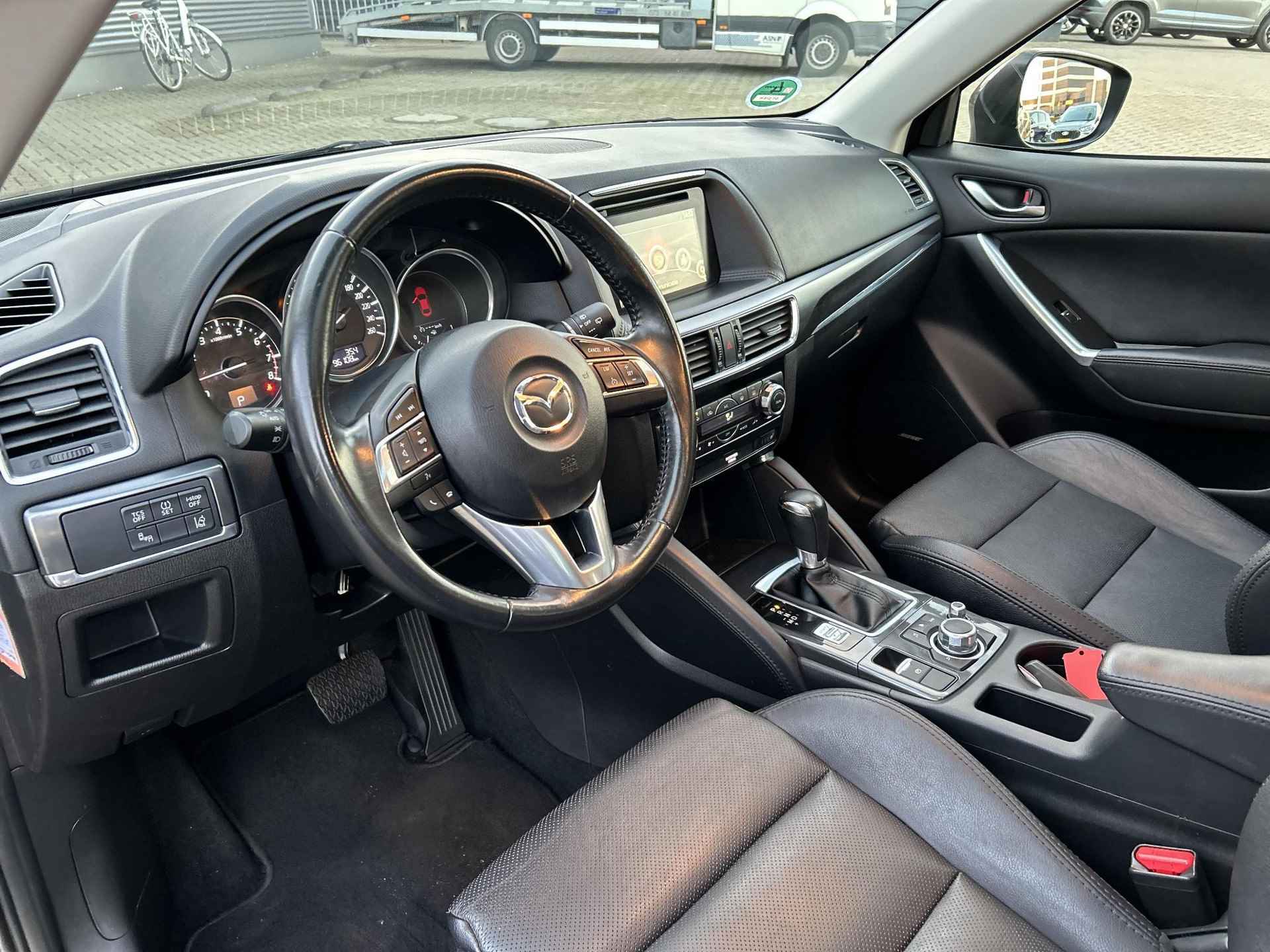 Mazda CX-5 2.0 SkyActiv-G 160 GT-M 4WD Automaat | Rijklaarprijs! | Trekhaak 1.800kg! |  Lage km-stand! | Schuifdak |  Climate Control | Navi | Leder | Stoelverwarming | Elektrische stoelen met geheugen | Inclusief 12 maanden Bovag-garantie! | - 10/28