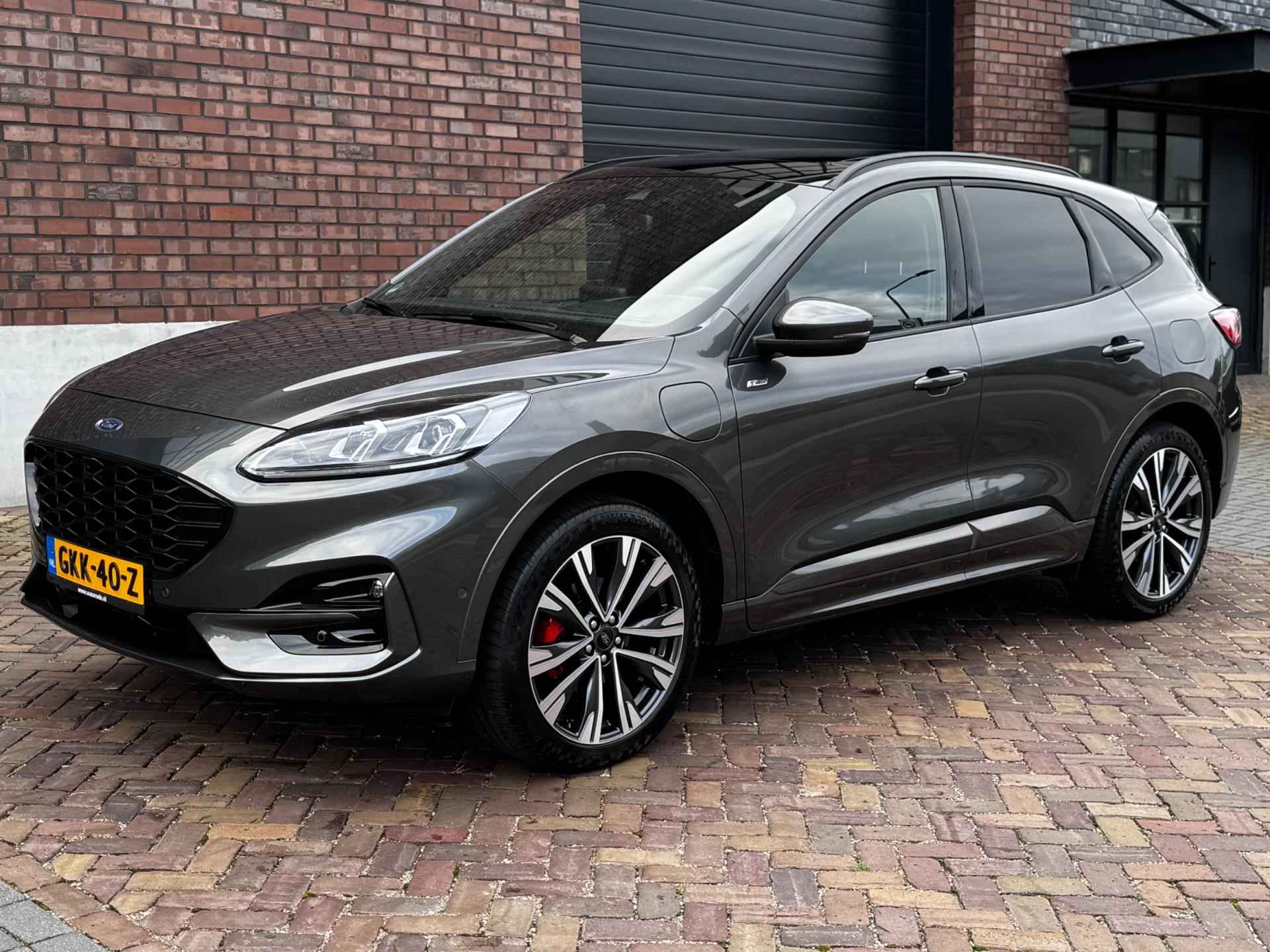 Ford Kuga 2.5 PHEV ST-Line X / 225 PK / Panoramadak / Adaptive Cruise / Navi + Camera / Elek. Achterklep / Stoel + Stuurverwarming - 14/61