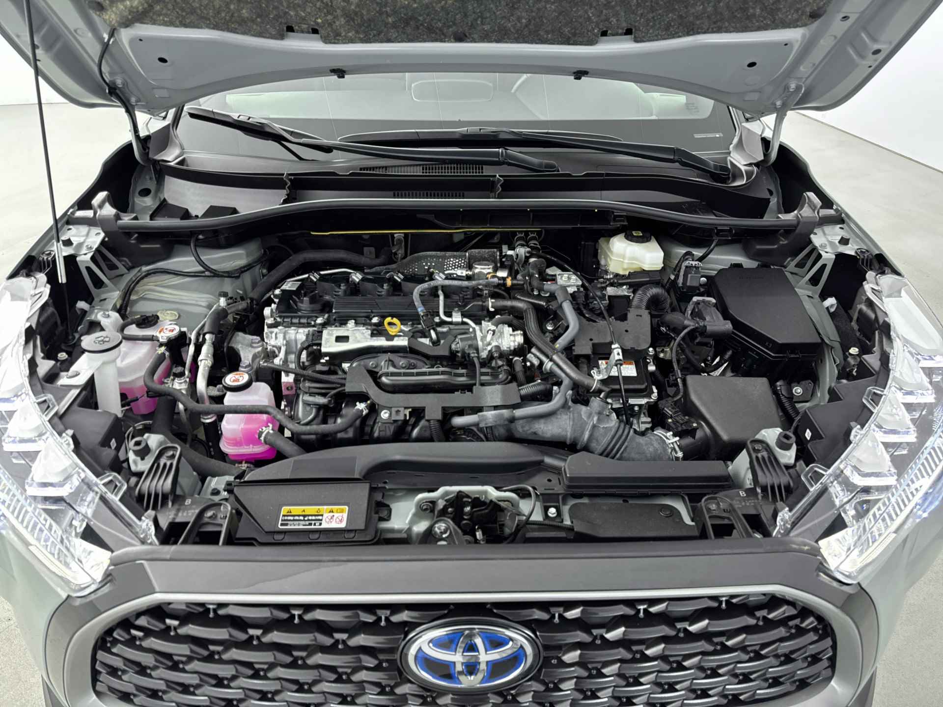 Toyota Corolla Cross 2.0 High Power Hybrid First Edition | Lichtmetalen Velgen | Parkeersensoren | Navigatie | - 37/39