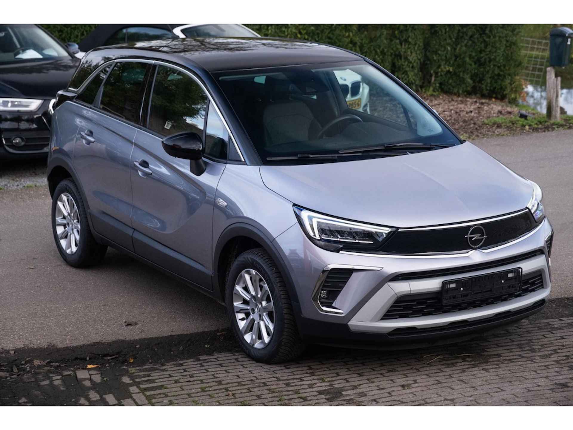 Opel Crossland 1.2 130PK Turbo GS Line | Automaat | Stoel/Stuur verwarming | Navigatie | Clima | Cruise | Lichtmetaal | All Season | Leder\Stof | Rijstrooksensor | Getint glas | Zwart dak | Bluetooth | Carplay - 13/21