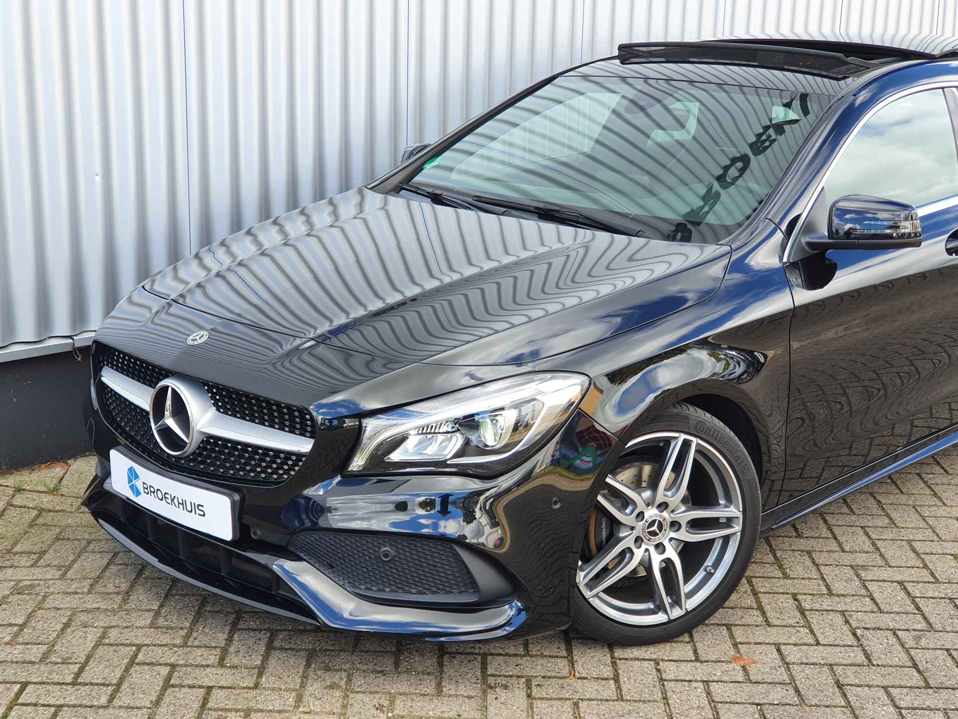 Mercedes-Benz CLA-Klasse Shooting Brake 180 AMG | 1e eigenaar | Panoramadak | Stoelverwarming | Camera - 33/34