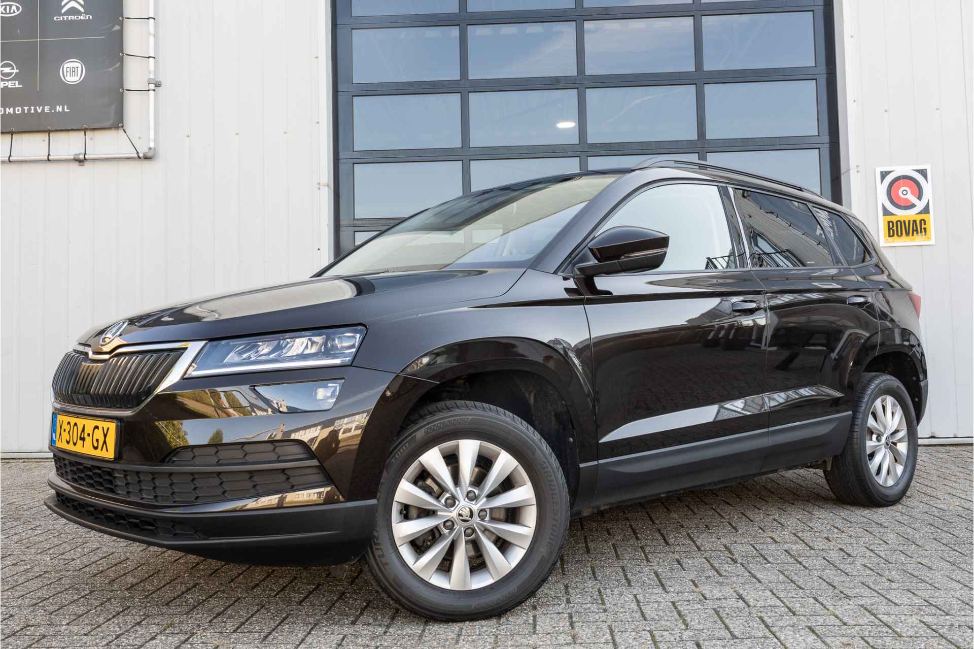 Škoda Karoq 1.0 TSI Ambition Business DSG ✅1jaarBOVAG✅NAV✅CLIM✅LED - 3/27