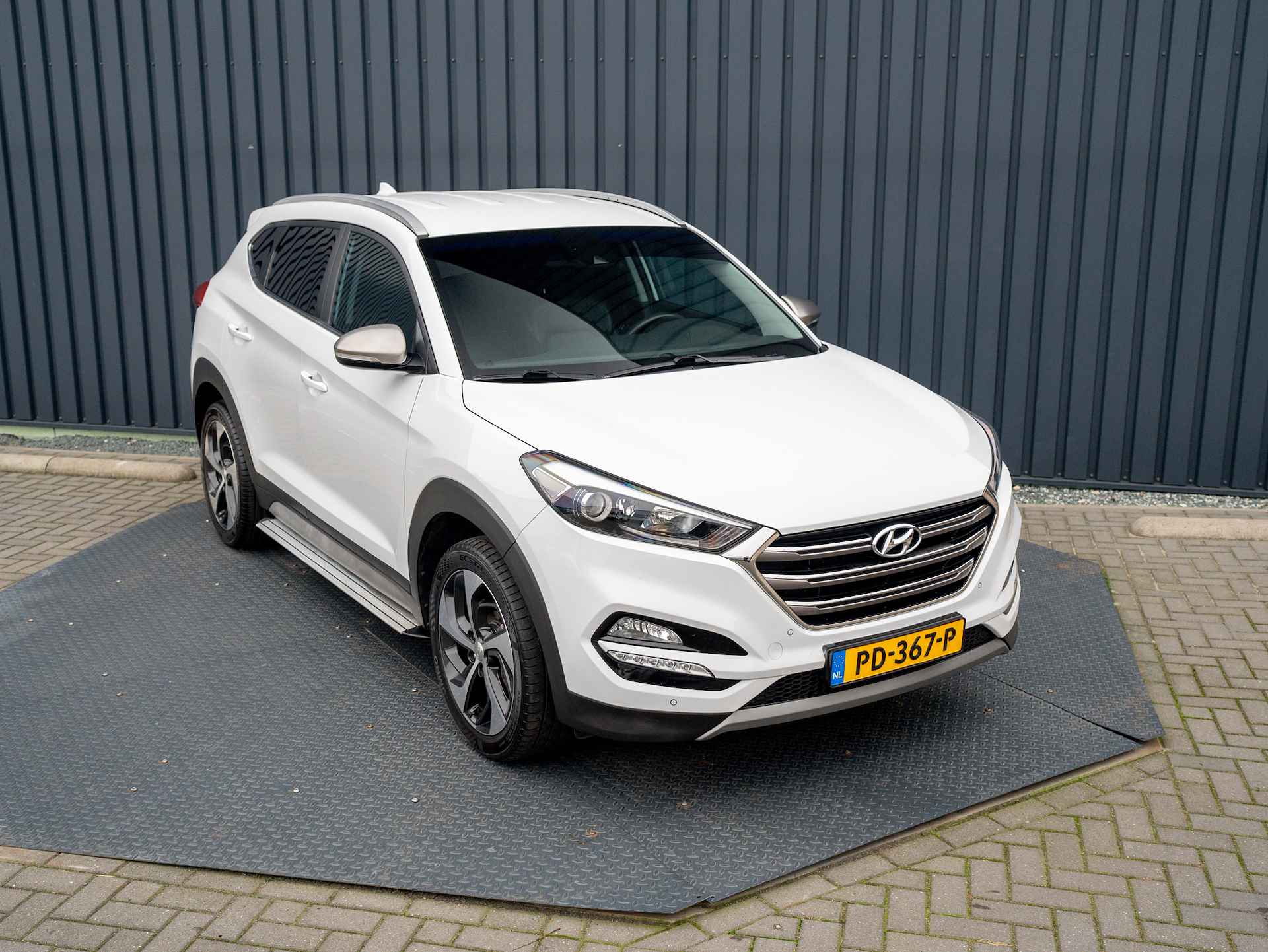 Hyundai Tucson 1.6 GDi Comfort | Leder | Stoelverwarming | Xenon | Camera | PDC V&A | Prijs Rijklaar!! - 34/42