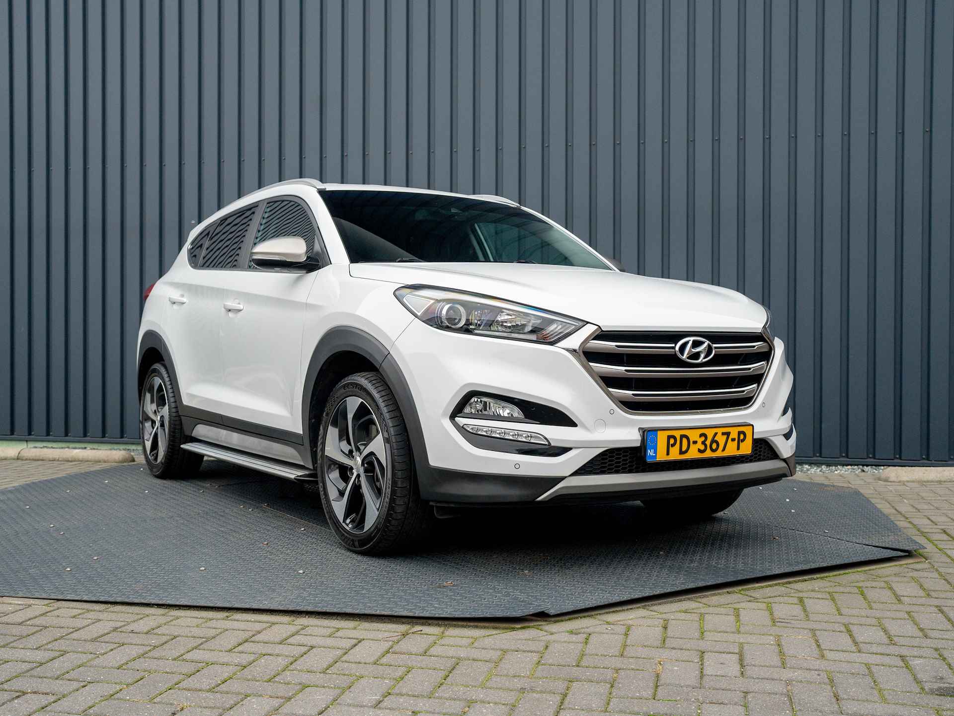 Hyundai Tucson 1.6 GDi Comfort | Leder | Stoelverwarming | Xenon | Camera | PDC V&A | Prijs Rijklaar!! - 40/42