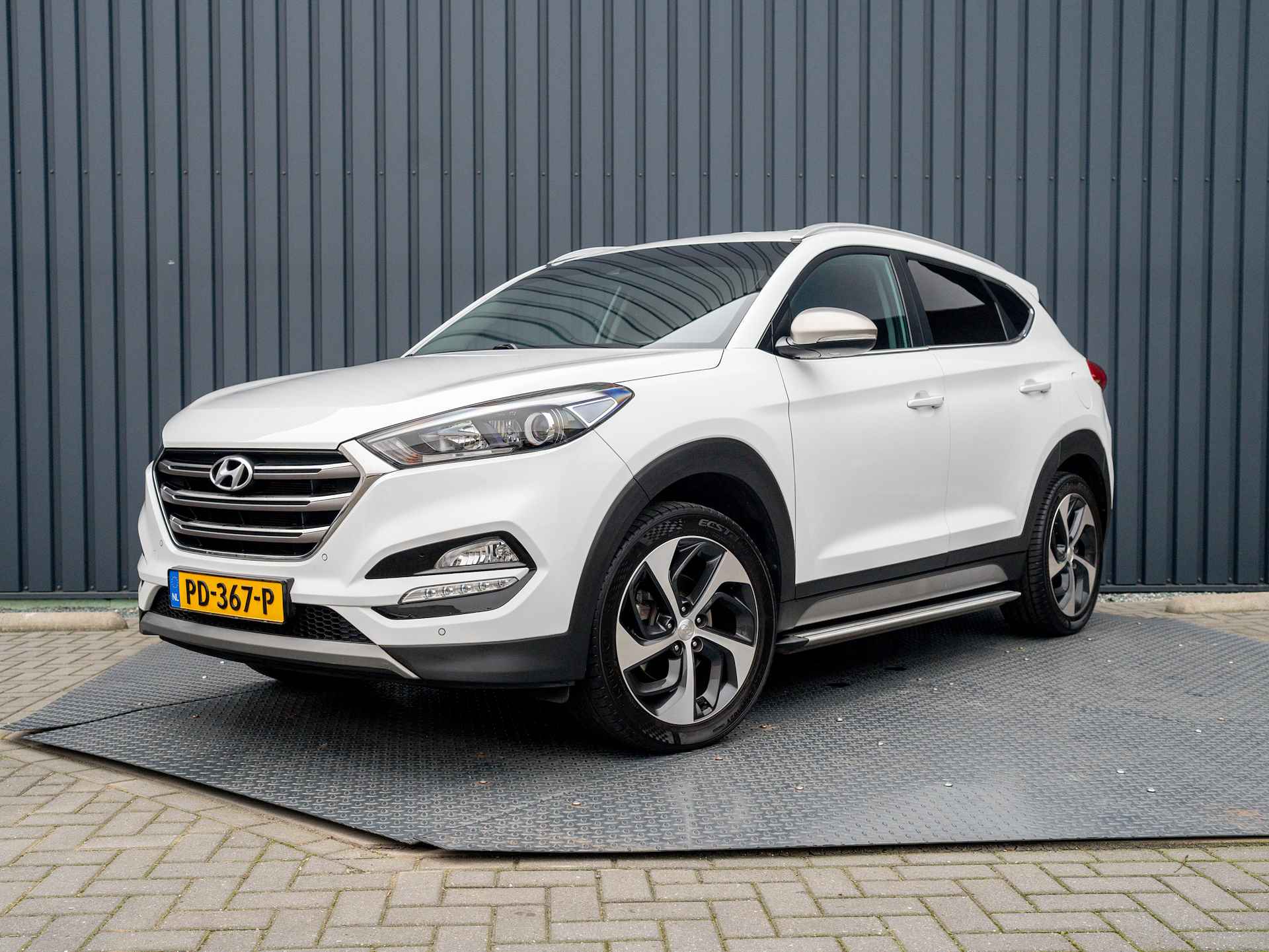 Hyundai Tucson 1.6 GDi Comfort | Leder | Stoelverwarming | Xenon | Camera | PDC V&A | Prijs Rijklaar!! - 42/42