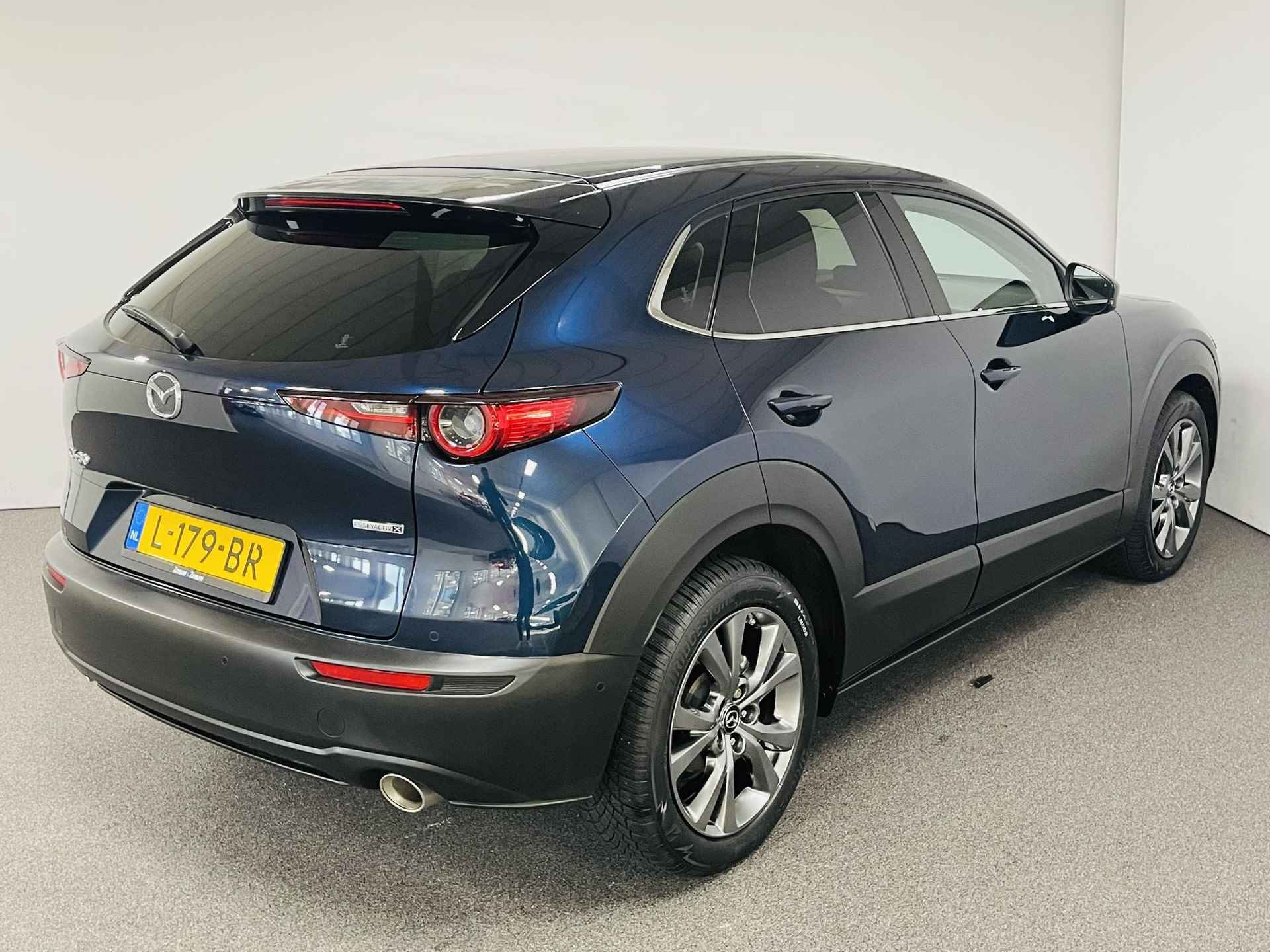 Mazda CX-30 2.0 e-SkyActiv-X M Hybrid Luxury AUTOMAAT  Airco camera parkeersensoren schuifkanteldak adaptieve cruise controle met stuur correctie electrische kofferklep navi applae carplay android auto zeer mooie auto pas 22000 km - 2/26