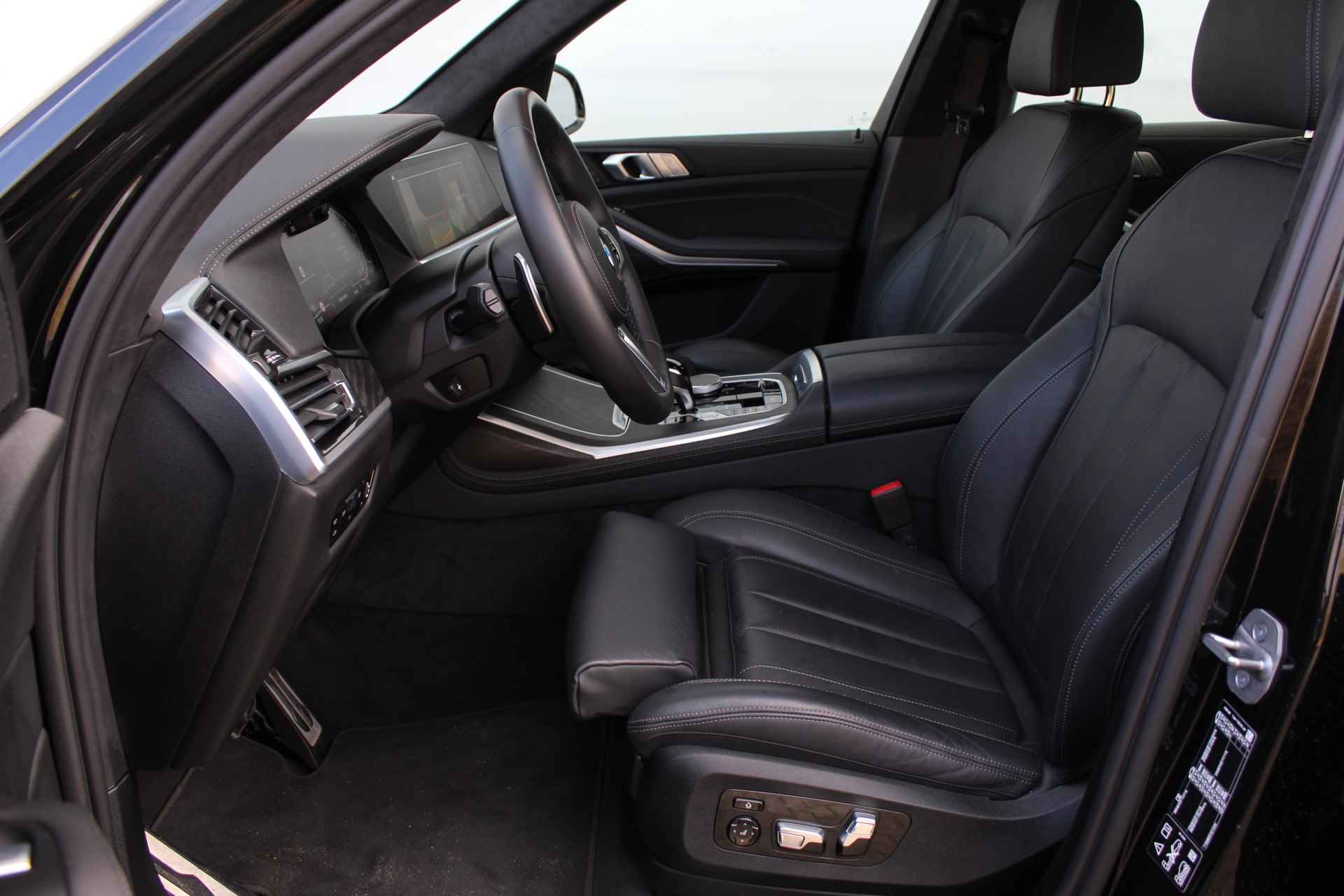 BMW X7 xDrive40i High Executive M Sport Automaat / Panoramadak Sky Lounge / Trekhaak / Laserlight / Head-Up / Parking Assistant Plus / Live Cockpit Professional / Stoelverwarming voor + achter - 11/35