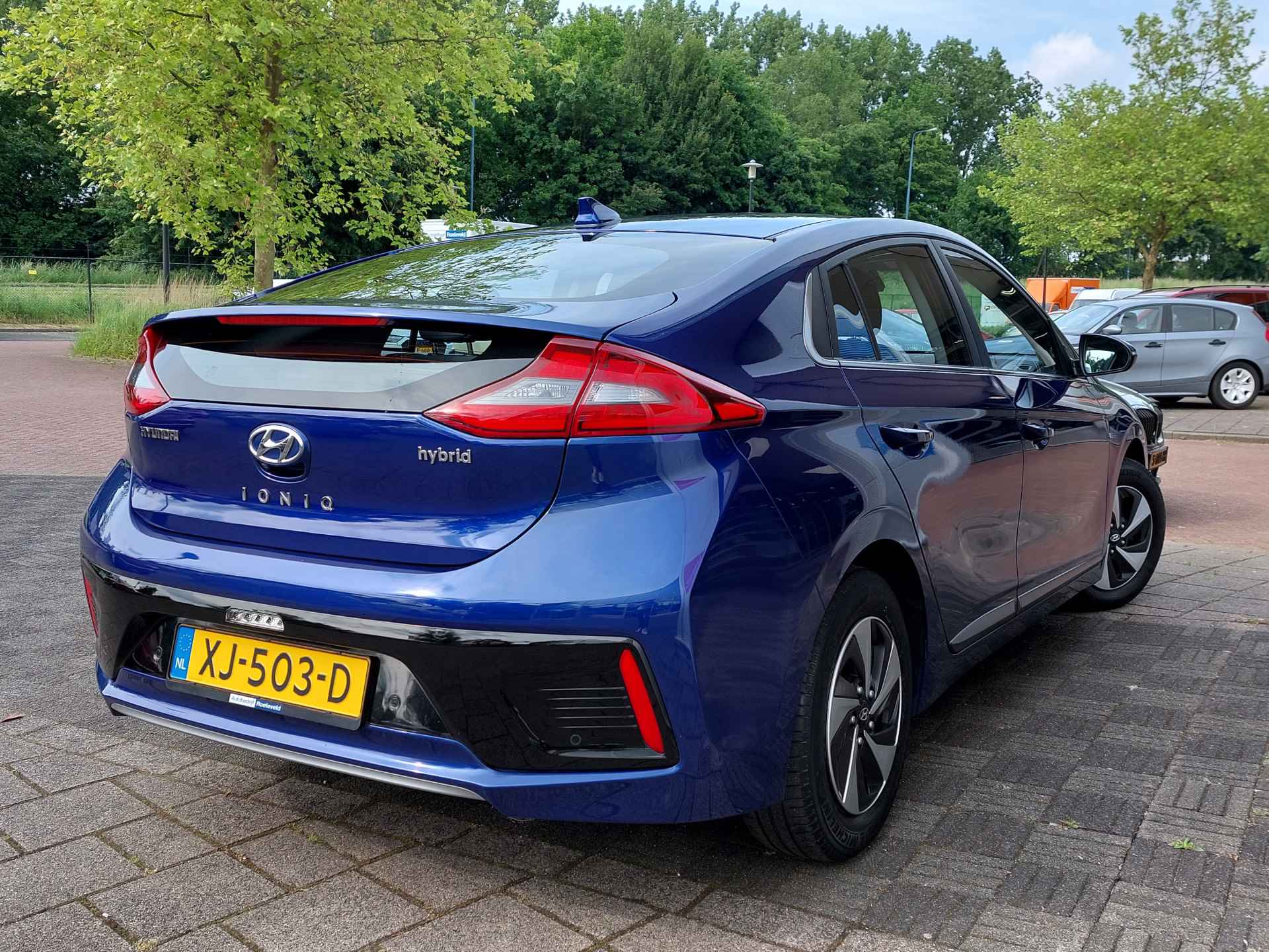 Hyundai IONIQ 1.6 GDi 105pk Hybrid Comfort 5-Deurs | Navi + Apple Carplay + Android Auto | Clima | Adap. Cruise | Bi-Xenon | Keyless Entry | Pdc V+A+Camera | Rijstrook+Licht+Regensensor | 15''lm - 7/52