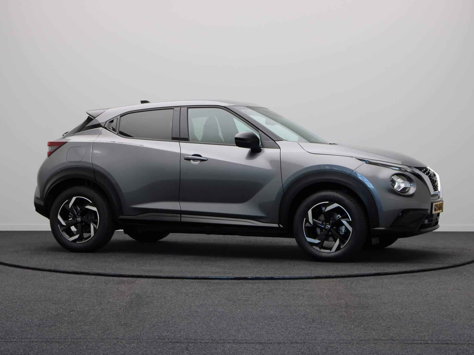 Nissan Juke 1.0 DIG-T N-Connecta | Achteruitrij Camera | Stoel, Stuur en Voorruit verwarming | Climate Control | Apple Carplay | Passagiersstoel In Hoogte Verstelbaar | - 13/50