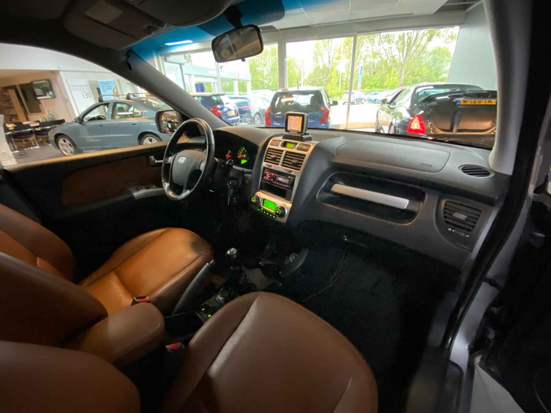 Kia Sportage 2.0 CVVT X-ception In nieuwstaat, Lederen bekleding, Climate control, Cruise control. - 12/19