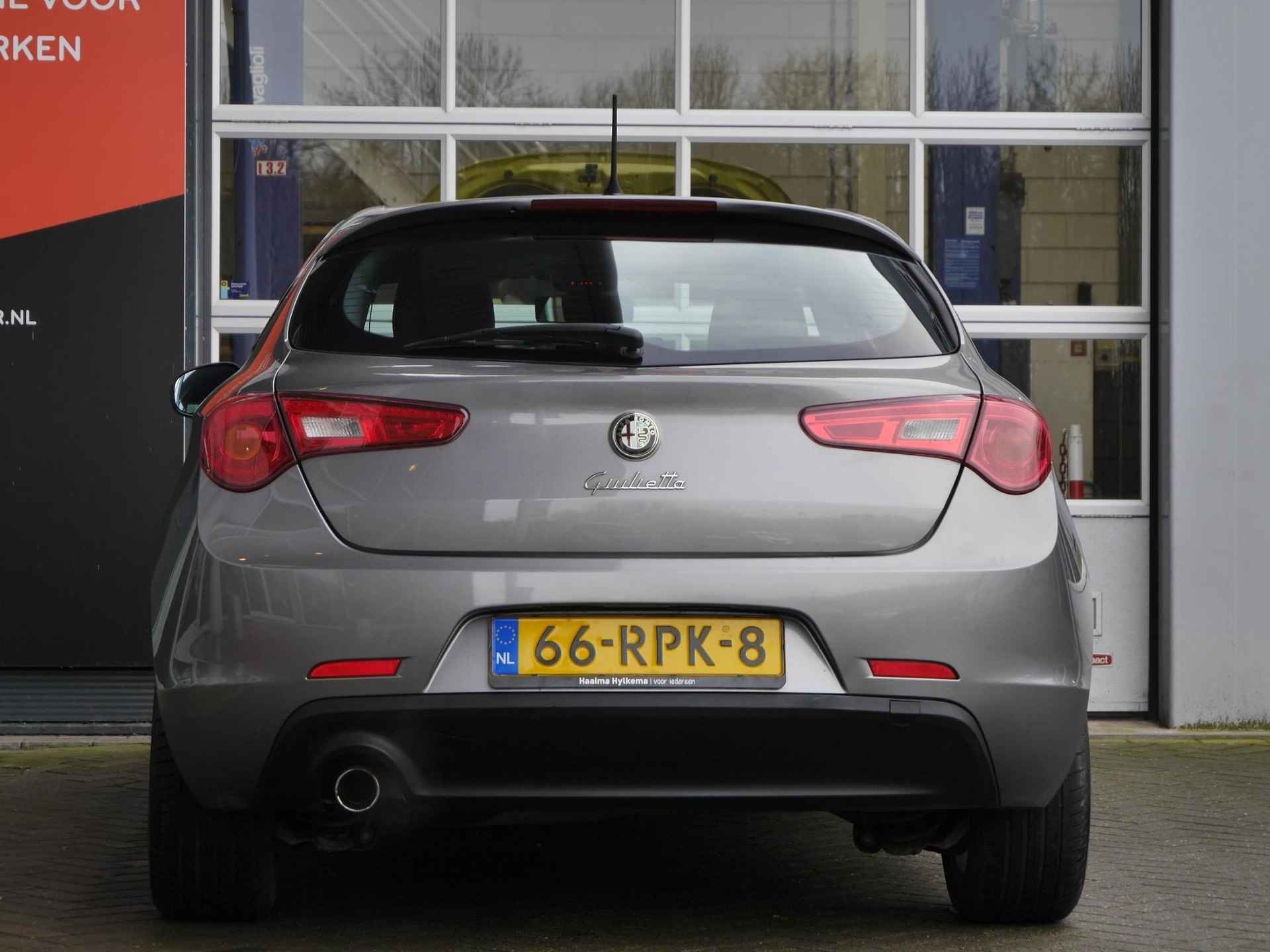 Alfa Romeo Giulietta 1.4 T Distinctive 120PK | Lichtmetalen velgen | Climate control | Cruise control | Elektrische ramen | DNA schakelaar | Mistlampen - 4/30