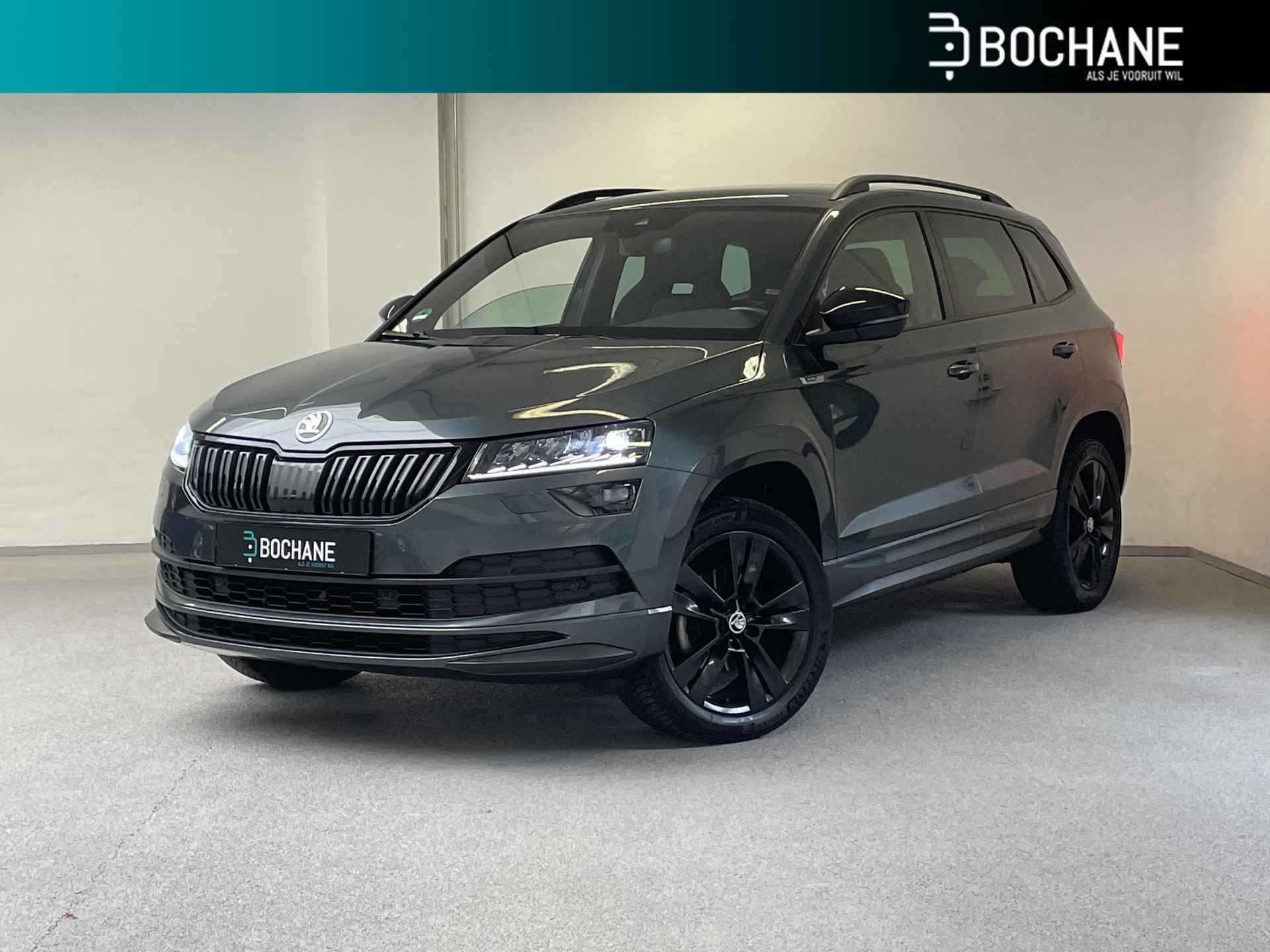 Skoda Karoq 1.5 TSI DSG Sportline | 1e-EIG. | ORG.NL | TREKHAAK | CAMERA | CARPLAY | STOEL.V.W. | - 1/44