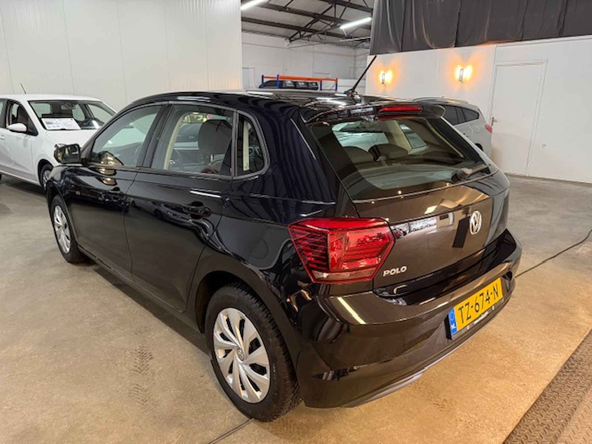 Volkswagen Polo 1.0 TSI Comfortline - 7/14