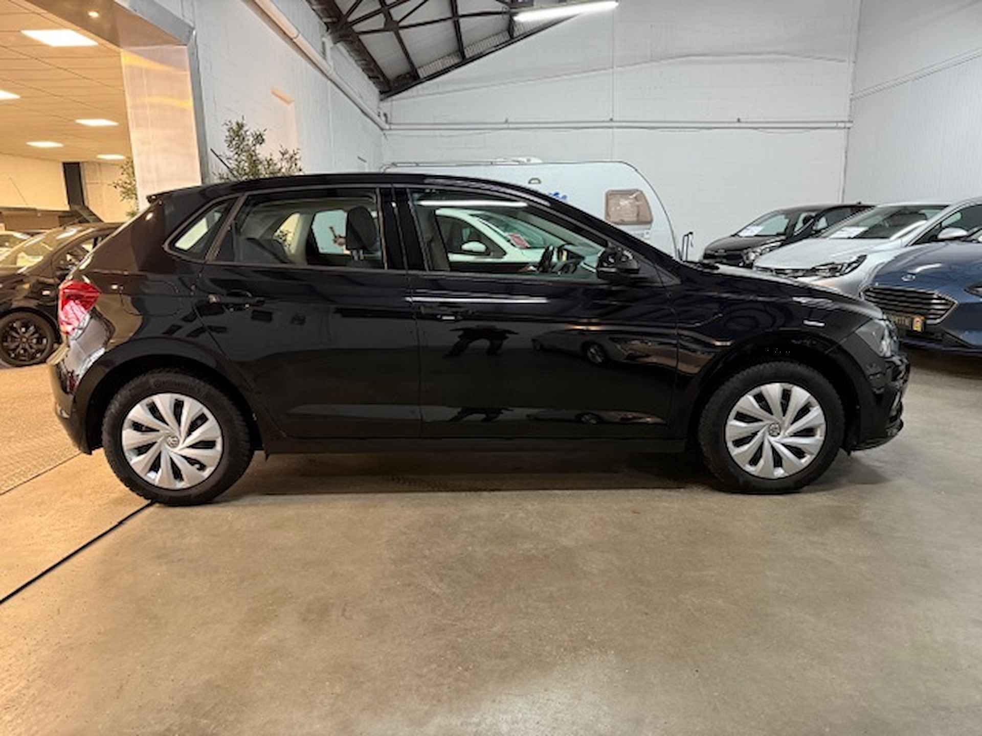 Volkswagen Polo 1.0 TSI Comfortline - 8/14