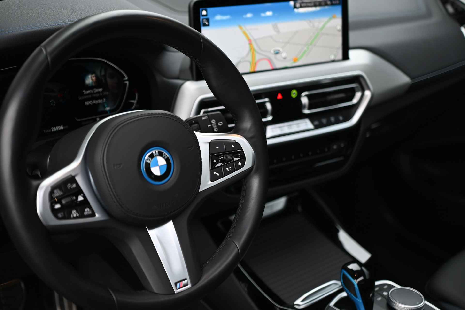 BMW iX3 High Executive Automaat / Sportstoelen / Stoelverwarming / Adaptief onderstel / Parking Assistant Plus / Adaptieve LED / Harman Kardon / Head-Up / Live Cockpit Professional - 27/33