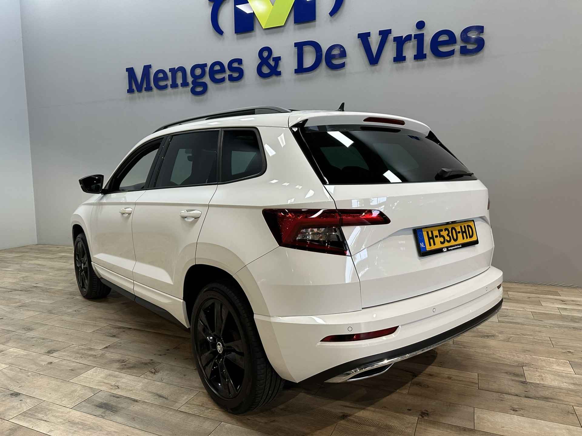 Škoda Karoq 1.5 TSI ACT Sportline Business Airco ECC | Virtual | LED | Panorama | Canton | Trekhaak | Adaptive Cruise | Apple Carplay Android Auto | Isofix | NAP | - 5/52