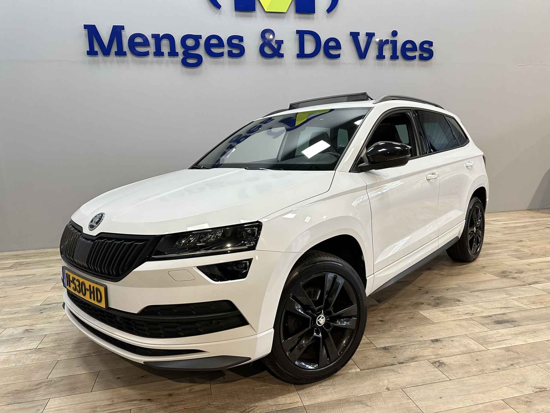 Škoda Karoq 1.5 TSI ACT Sportline Business Airco ECC | Virtual | LED | Panorama | Canton | Trekhaak | Adaptive Cruise | Apple Carplay Android Auto | Isofix | NAP | - 7/52