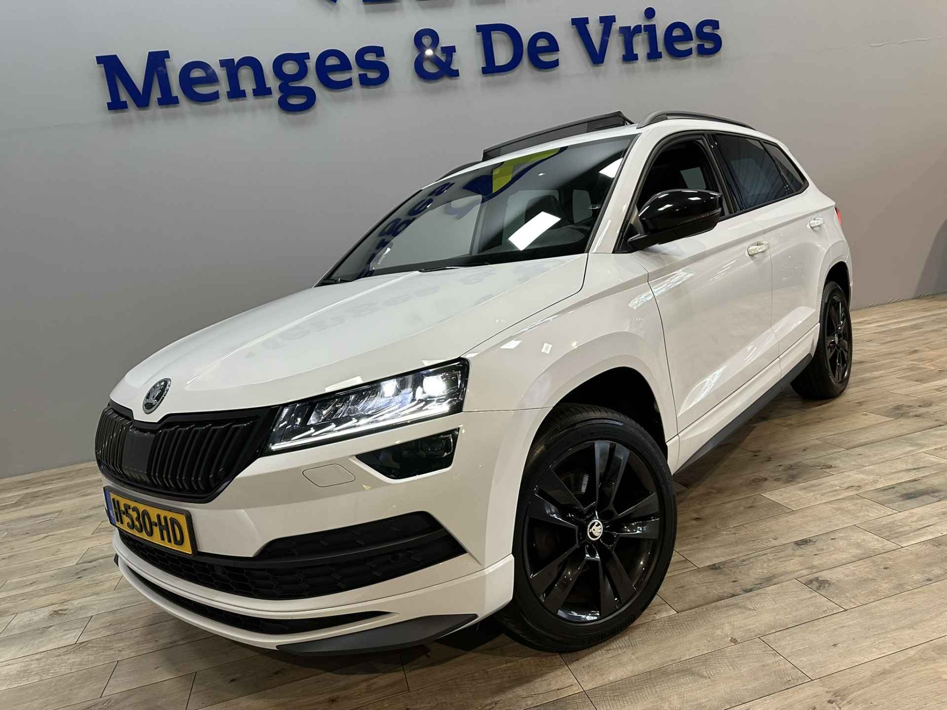 Škoda Karoq 1.5 TSI ACT Sportline Business Airco ECC | Virtual | LED | Panorama | Canton | Trekhaak | Adaptive Cruise | Apple Carplay Android Auto | Isofix | NAP | - 47/52