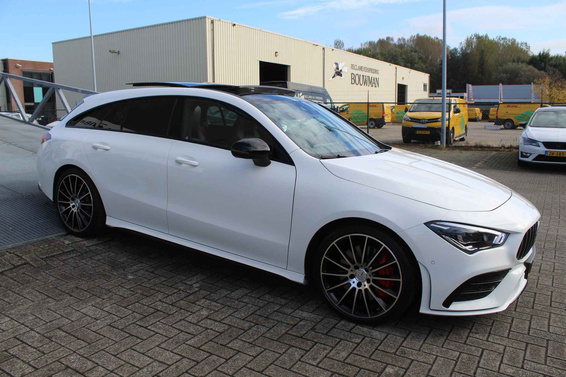 Mercedes-Benz CLA-Klasse Shooting Brake AMG 35 4MATIC Premium Panoramadak/Sfeerverlichting/Navigatie/Achteruitrijcamera/Apple carplay/Elektrische achterk - 8/27