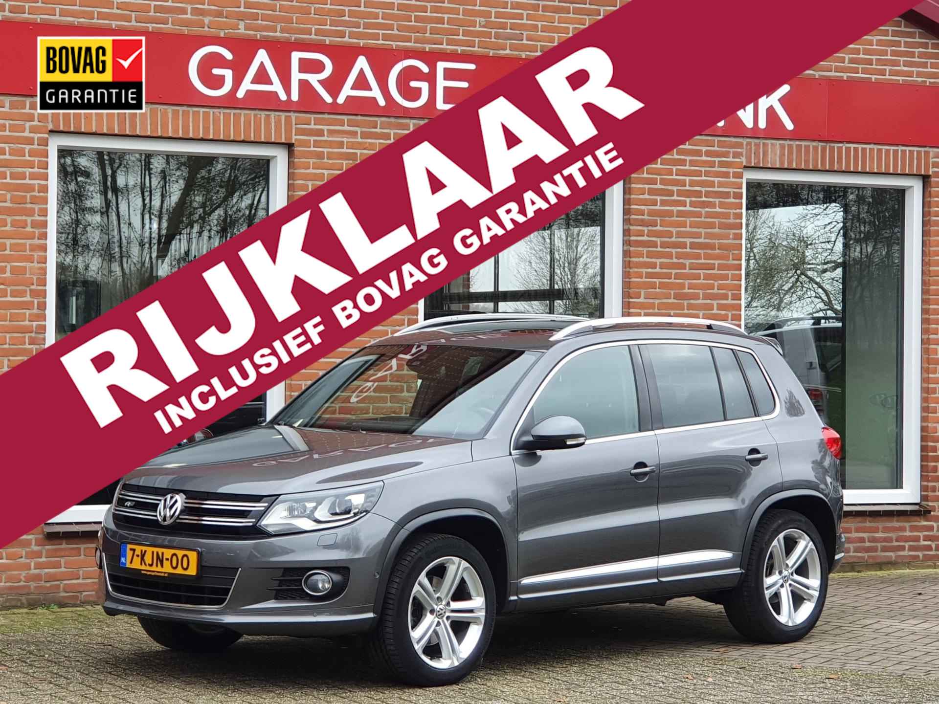 Volkswagen Tiguan 1.4 TSI Sport&Style R-line Edition 122PK 5drs clima, cruise, navi, xenon, trekhaak RIJKLAAR - 1/19