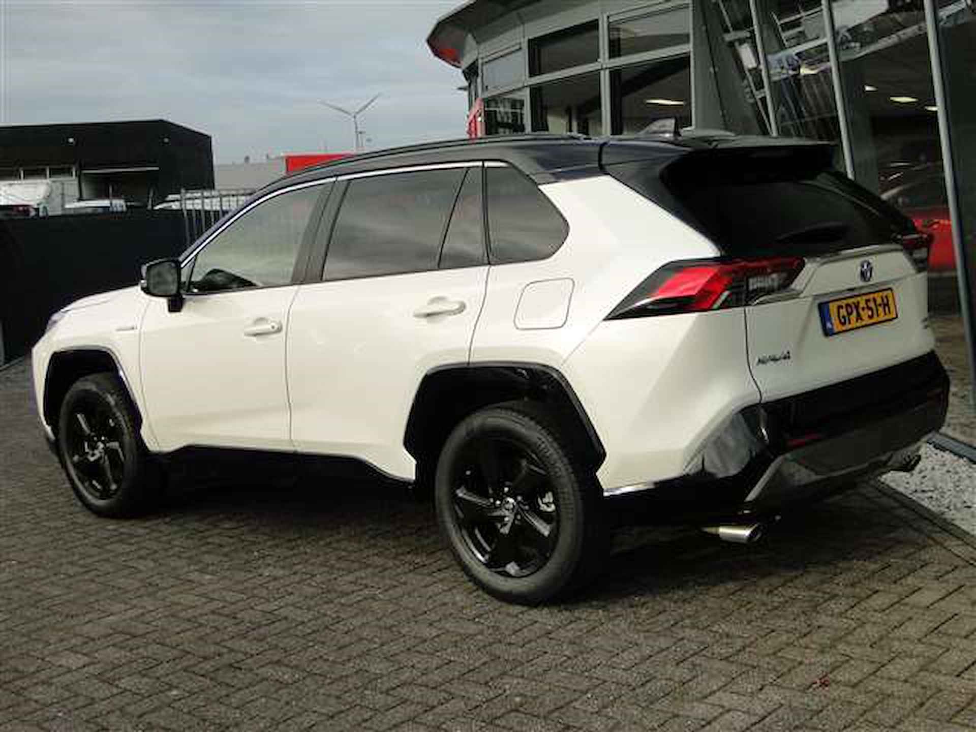 Toyota RAV4 2.5 Hybrid AWD 218pk Bi-Tone | Adaptief | JBL | Leer/Stof | Led - 2/16