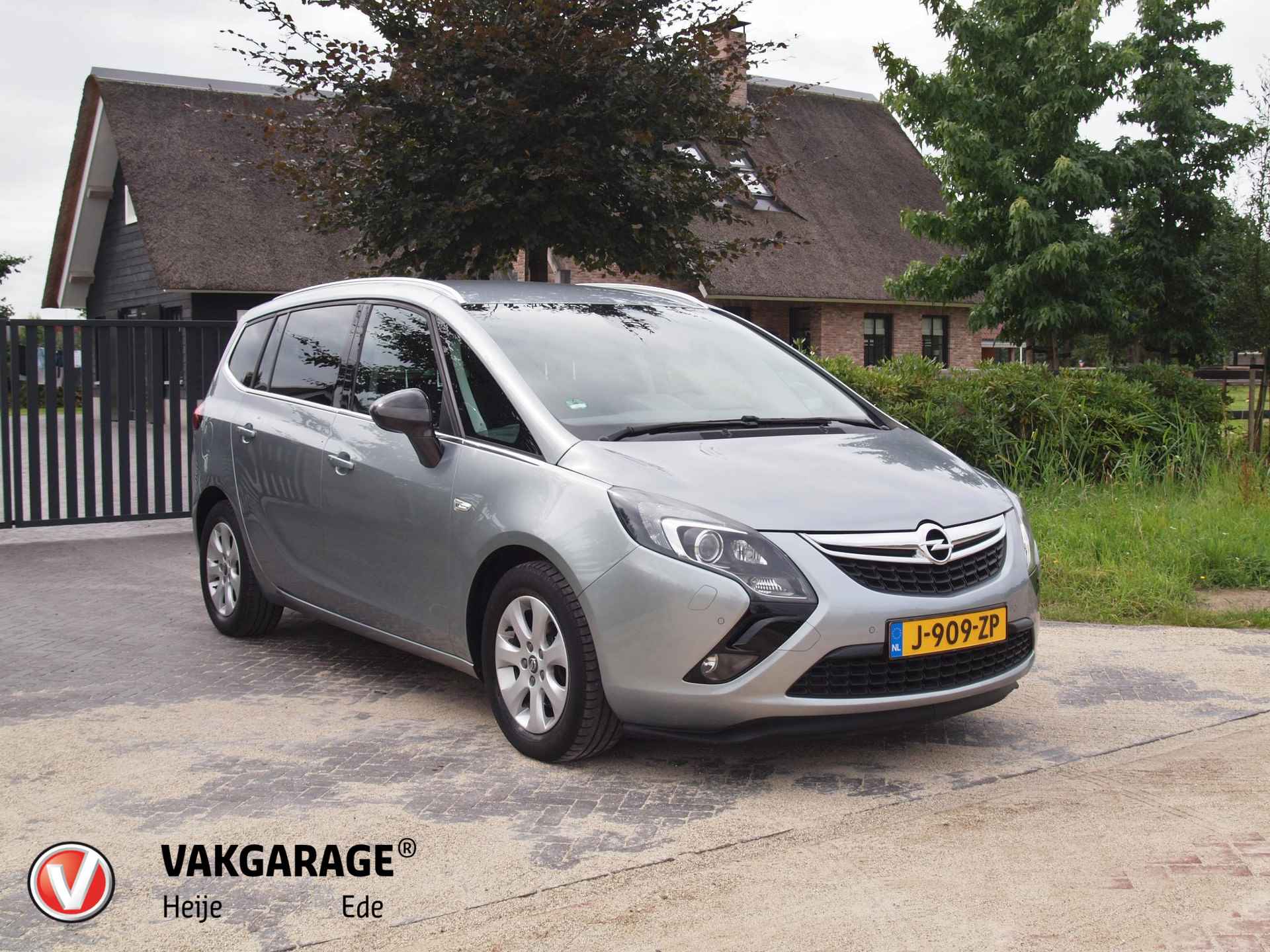 Opel Zafira Tourer 1.4 Cosmo | Cruise Control | Bluetooth | Navi | Trekhaak | - 1/27