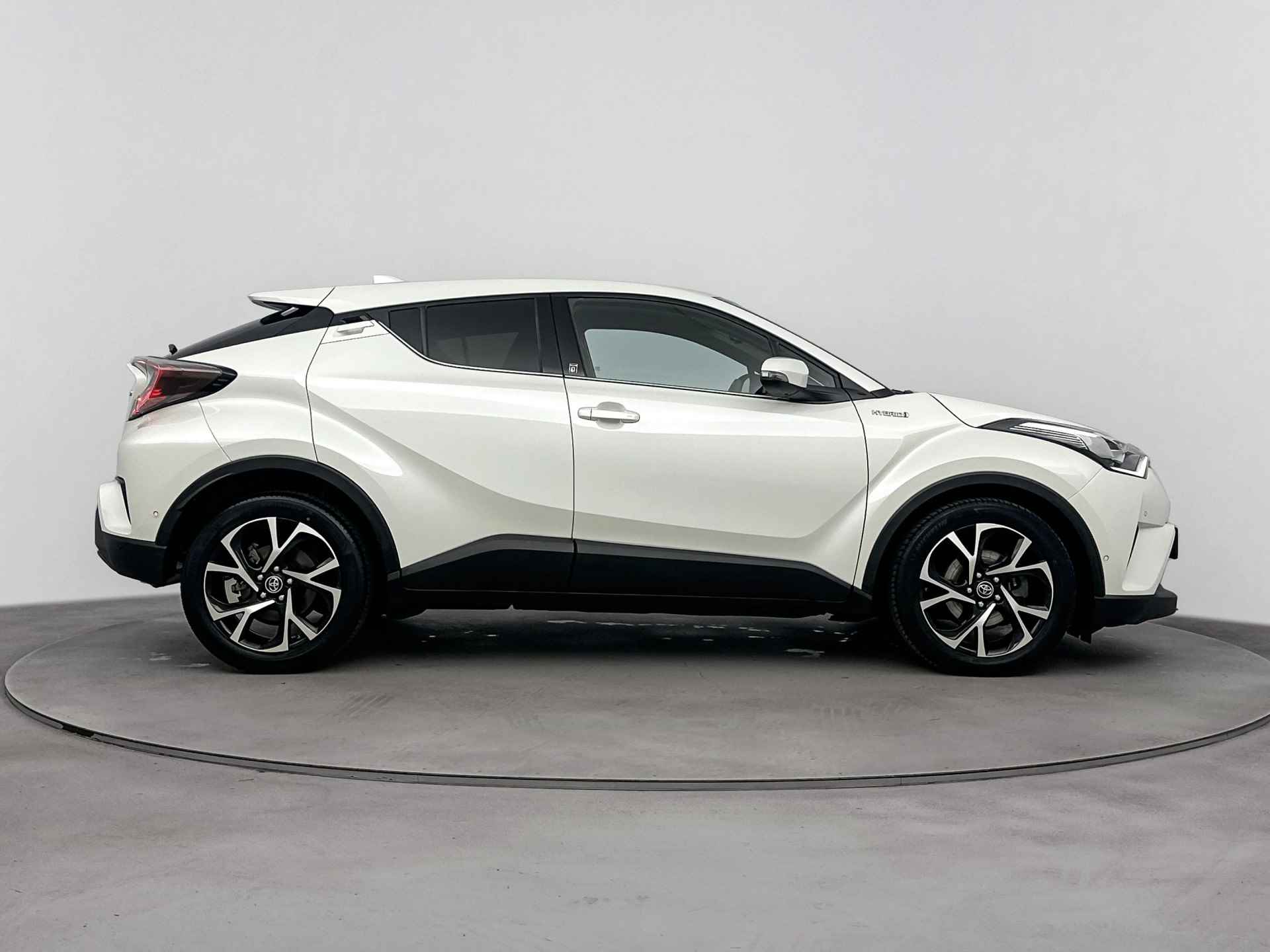 Toyota C-HR 1.8 Hybrid Style Limited | Navigatie | Stoel en stuurwiel verwarmd | Climate Control | LM velgen | Cruise Control Adaptief | - 14/40