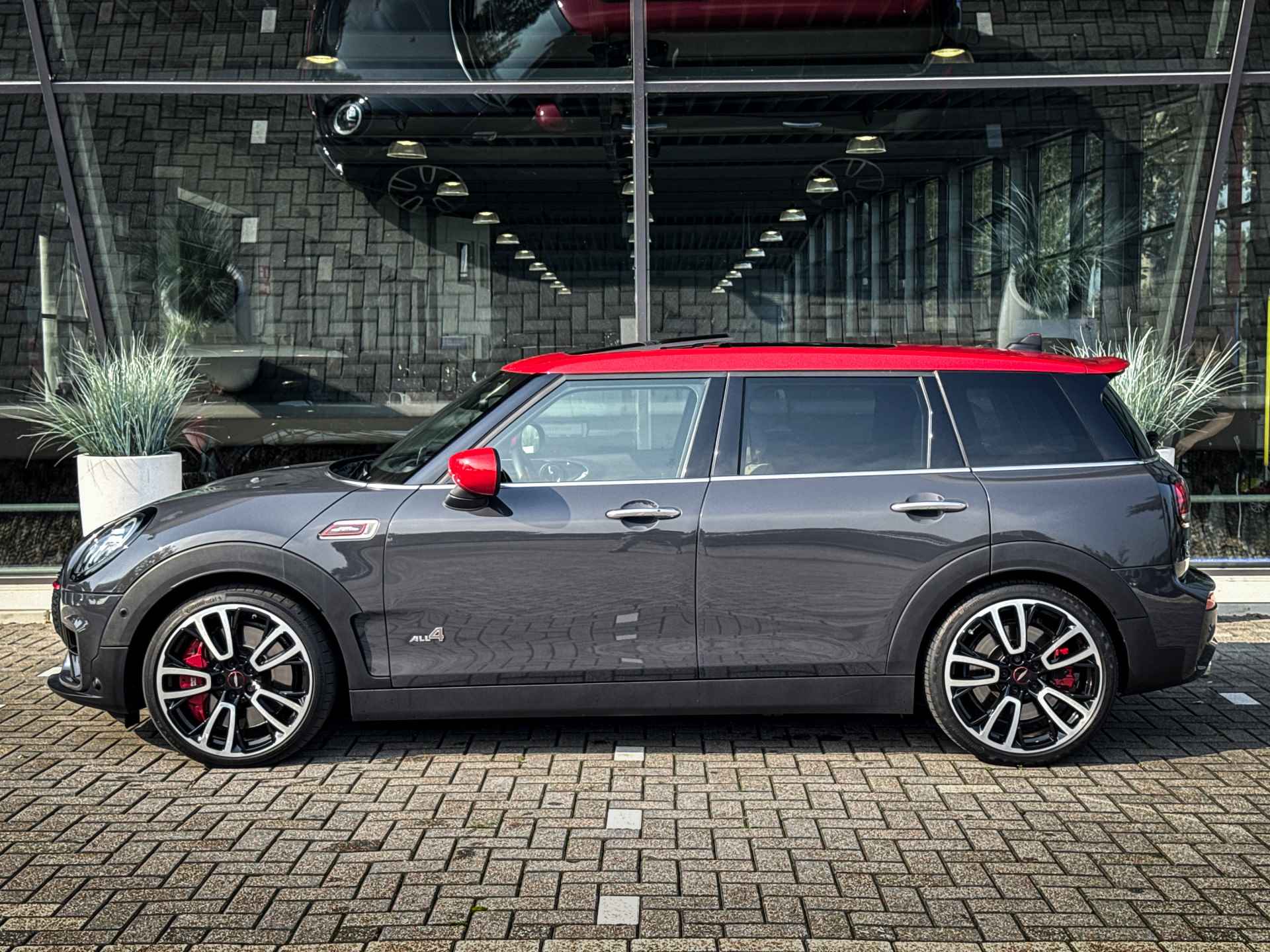 MINI Clubman JCW ALL4 Chili Automaat / Panoramadak / Achteruitrijcamera / Stoelverwarming / LED / Harman Kardon / Head-Up / Cruise Control / Comfort Access - 7/37