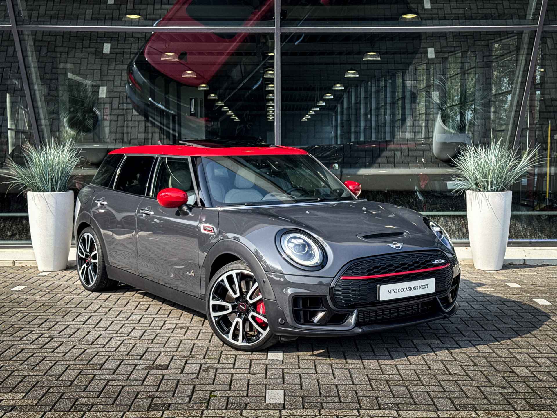 MINI Clubman JCW ALL4 Chili Automaat / Panoramadak / Achteruitrijcamera / Stoelverwarming / LED / Harman Kardon / Head-Up / Cruise Control / Comfort Access - 16/37