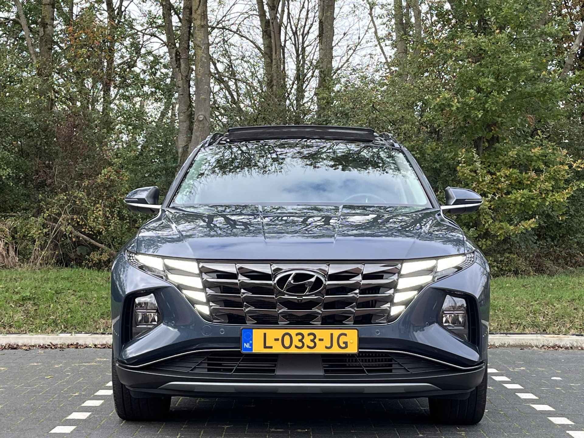 Hyundai Tucson 1.6 T-GDI HEV Premium Sky | Lederen bekleding & memory | Schuifkanteldak | 1ste eigenaar | - 4/45