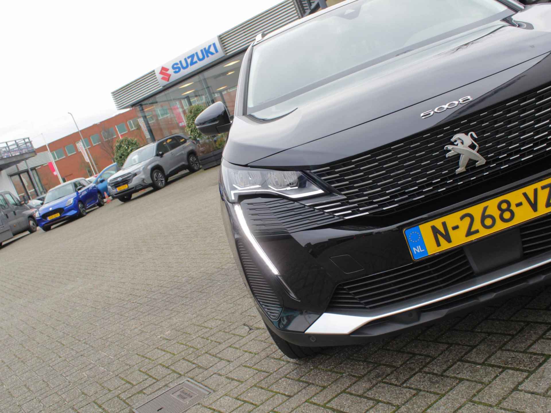 Peugeot 5008 1.2 PureTech Road Trip 7P Automaat | Navi | Cruise | Clima | Camera | Park sens | Lm-Velgen - 31/32