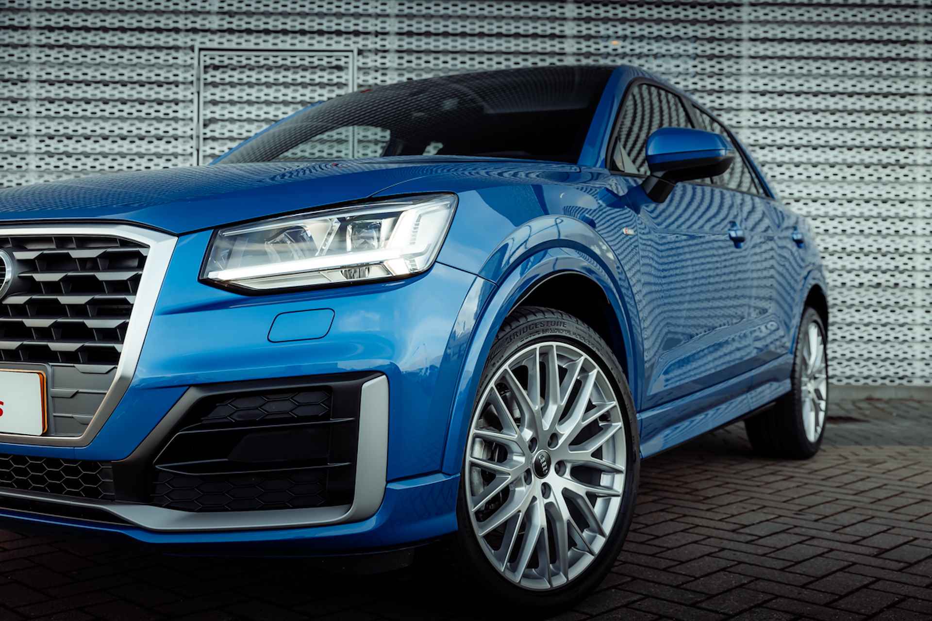 Audi Q2 35 TFSI 150pk s-tronic S Edition | S-line Interieur & Exterieur | Panoramadak | LED | Navigatie | 19" LM velgen - 9/32