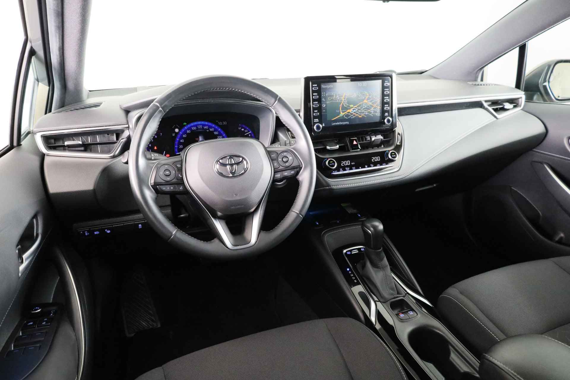 Toyota Corolla Touring Sports 1.8 Hybrid Business Intro | Trekhaak | Head-up Display | Parkeersensoren | Navigatie | Stoelverwarming | Draadloze telefoonlader | - 8/39