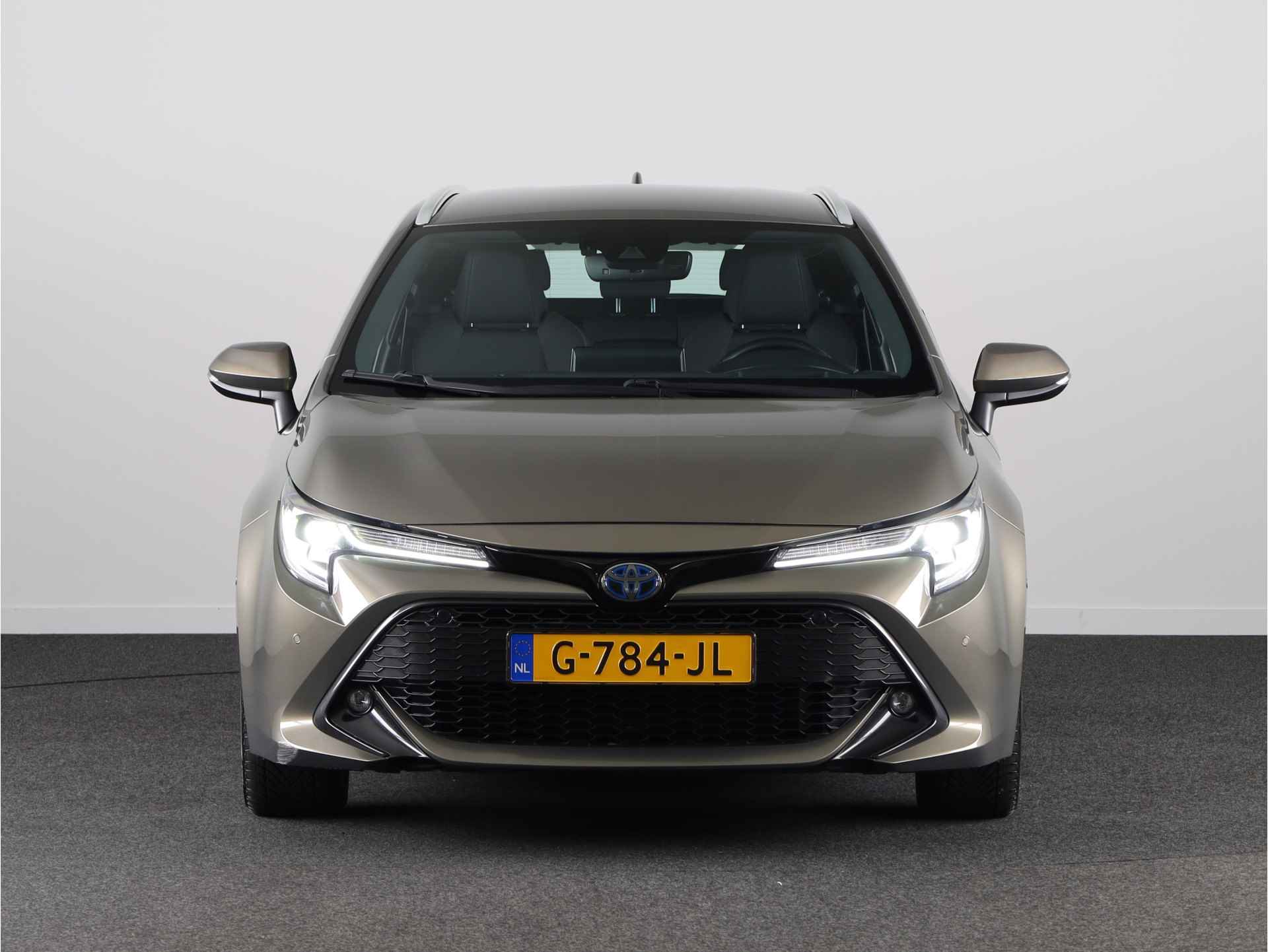 Toyota Corolla Touring Sports 1.8 Hybrid Business Intro | Trekhaak | Head-up Display | Parkeersensoren | Navigatie | Stoelverwarming | Draadloze telefoonlader | - 24/39