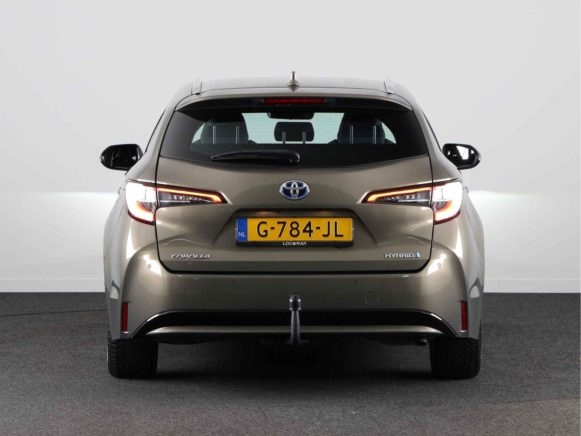 Toyota Corolla Touring Sports 1.8 Hybrid Business Intro | Trekhaak | Head-up Display | Parkeersensoren | Navigatie | Stoelverwarming | Draadloze telefoonlader | - 25/39