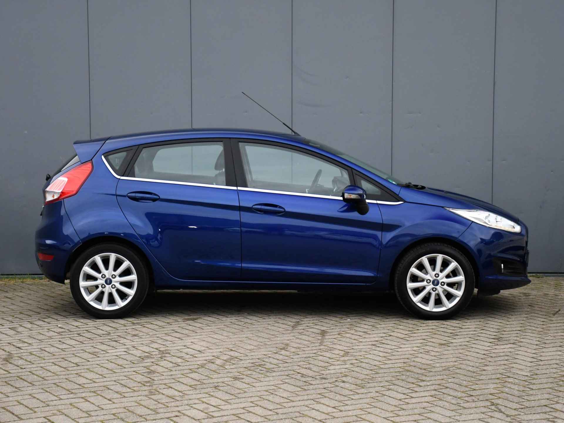 Ford Fiesta Titanium 1.0 EcoBoost 100pk CRUISE.C | NAVI | CLIMA | 16''LM | QUICK CLEAR | PDC ACHTER - 3/30