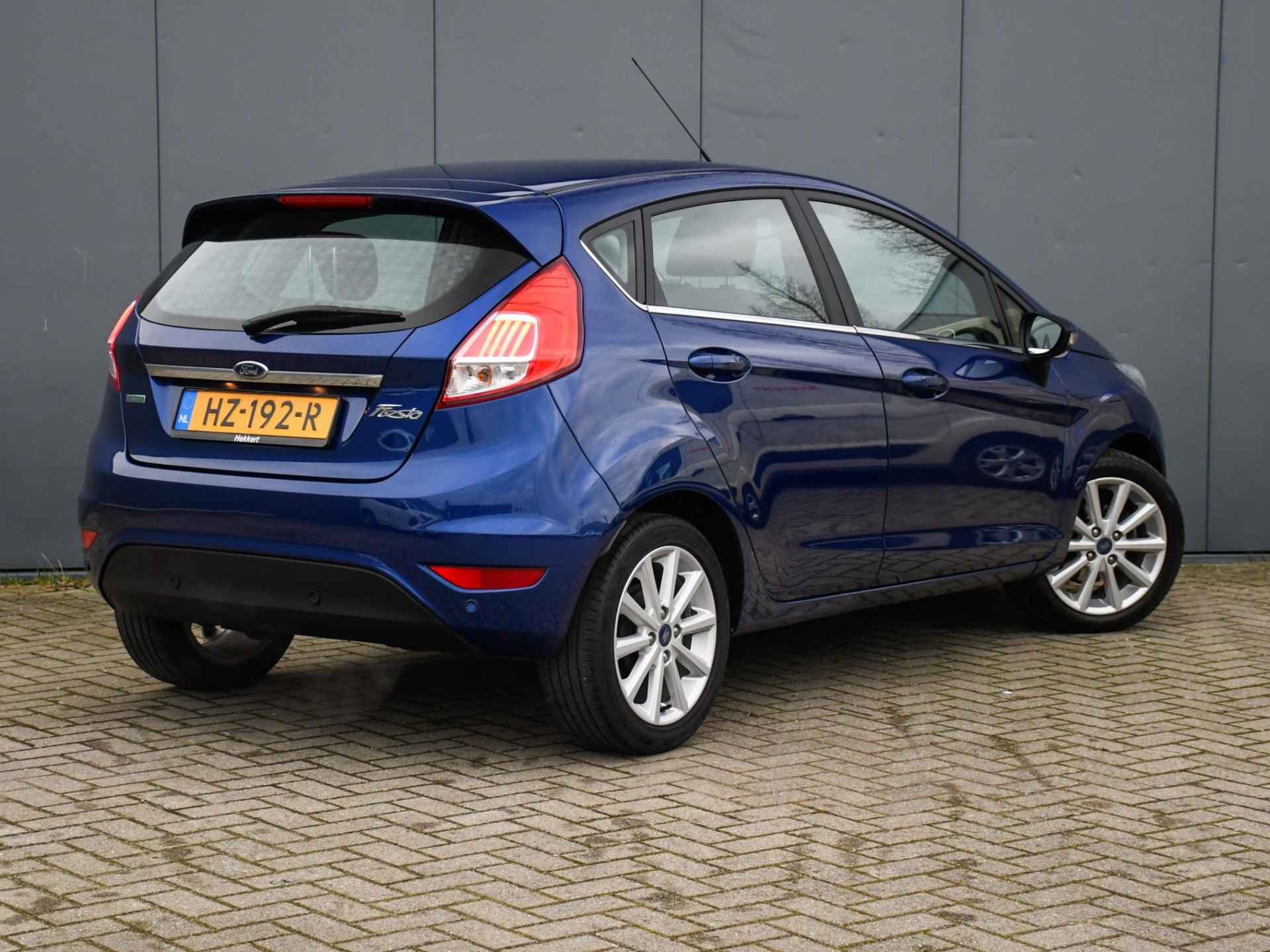 Ford Fiesta Titanium 1.0 EcoBoost 100pk CRUISE.C | NAVI | CLIMA | 16''LM | QUICK CLEAR | PDC ACHTER - 4/30