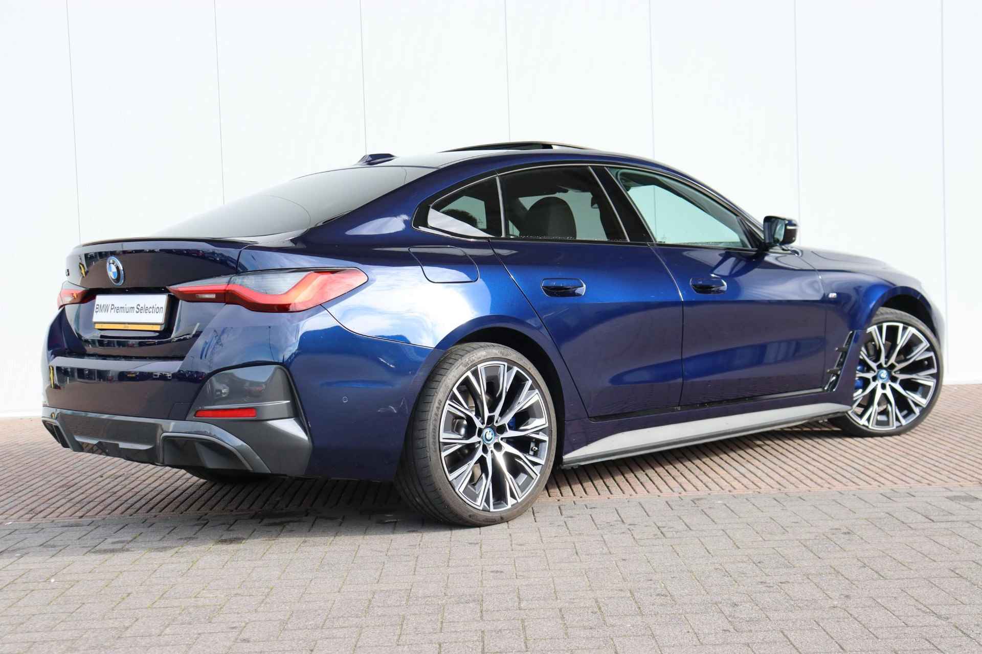 BMW i4 eDrive40 High Executive M-Sportpakket 84 kWh / Co-Pilot Pack / Harman Kardon / 20 '' / Schuif - Kanteldak - 7/25