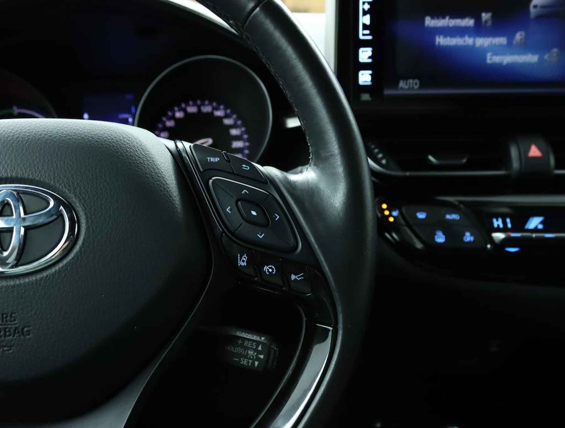 Toyota C-HR 1.8 Hybrid Style Ultimate | Adaptive Cruise Control | Achteruitrijcamera | Stoelverwarming | JBL Audio | - 21/56
