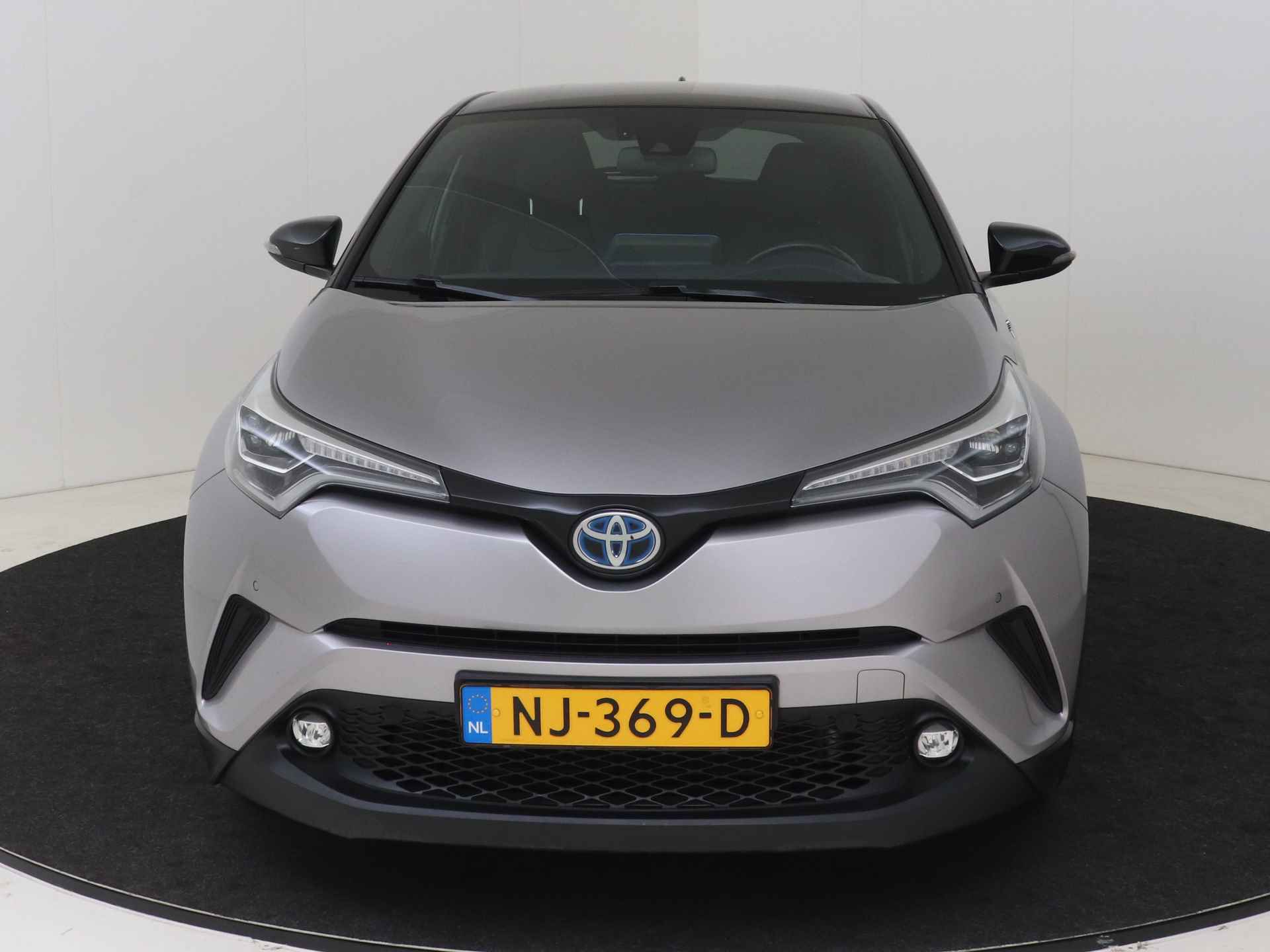 Toyota C-HR 1.8 Hybrid Bi-Tone Plus I Navigatie I Climate Control I Cruise Control I Camera I USB I LM Velgen I 1e Eigenaar I Lederen Bekleding I - 26/49