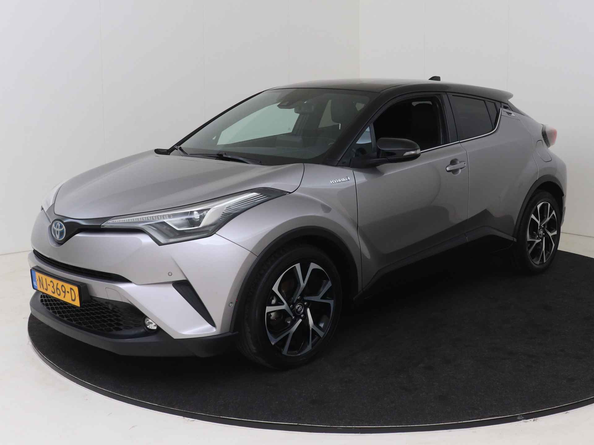 Toyota C-HR 1.8 Hybrid Bi-Tone Plus I Navigatie I Climate Control I Cruise Control I Camera I USB I LM Velgen I 1e Eigenaar I Lederen Bekleding I - 27/49