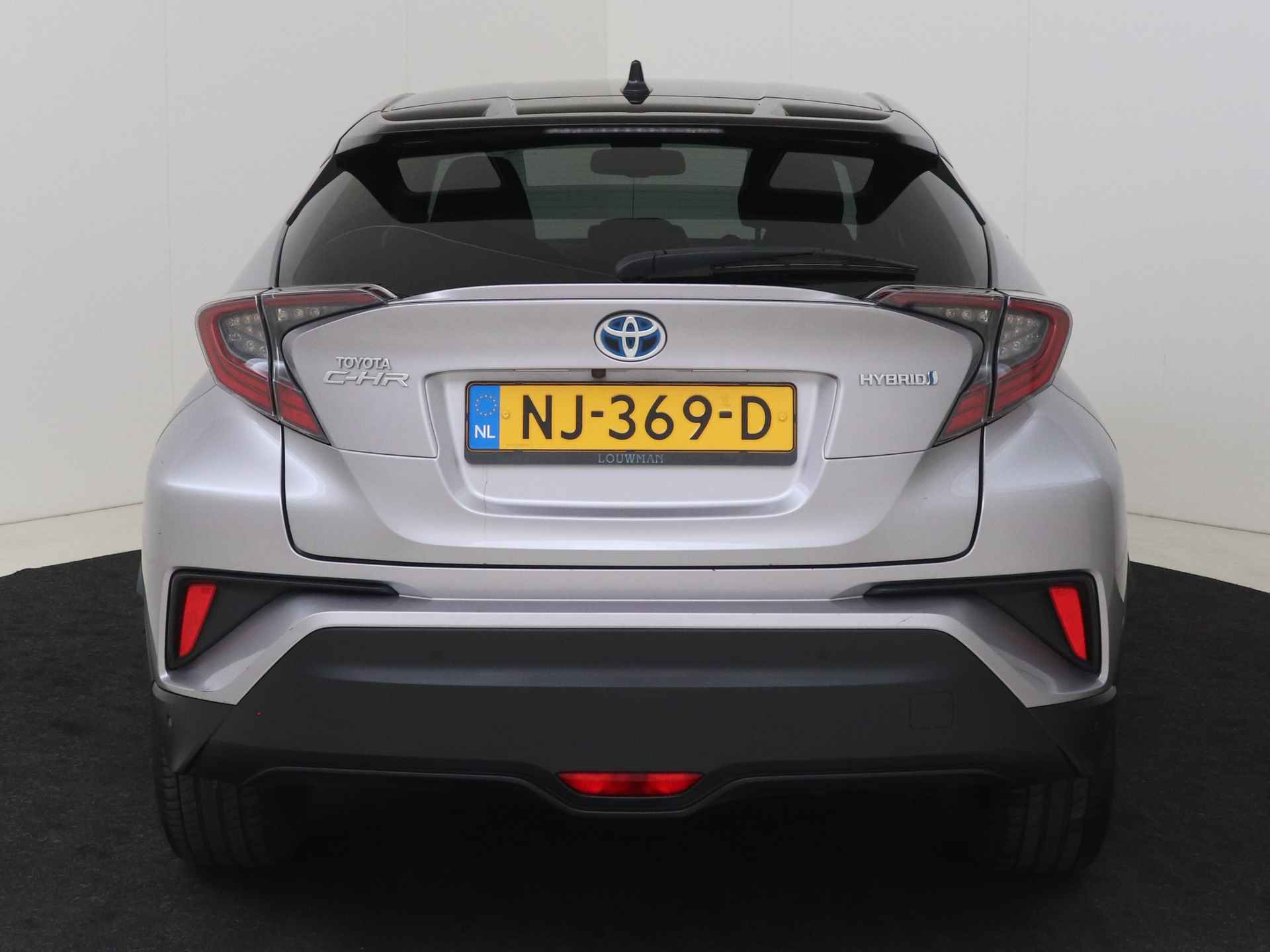 Toyota C-HR 1.8 Hybrid Bi-Tone Plus I Navigatie I Climate Control I Cruise Control I Camera I USB I LM Velgen I 1e Eigenaar I Lederen Bekleding I - 28/49