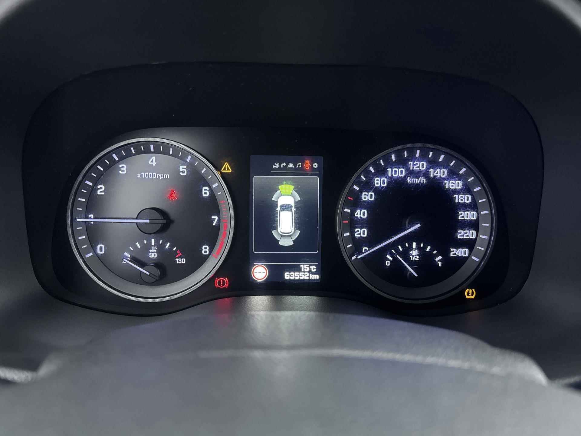Hyundai Tucson 1.6 132 pk Comfort | Navigatie | Camera | Trekhaak | Stoelverwarming - 24/35