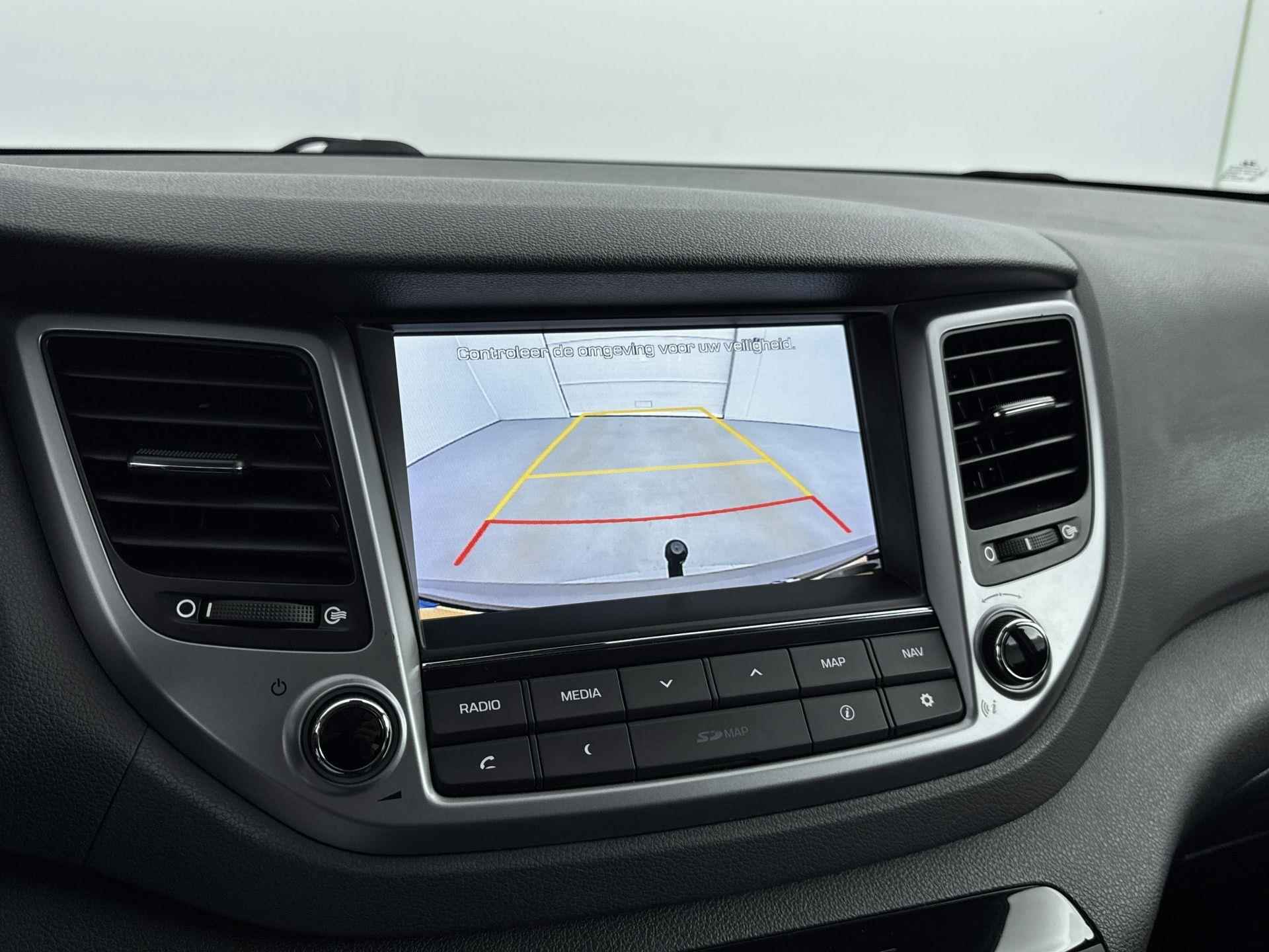 Hyundai Tucson 1.6 132 pk Comfort | Navigatie | Camera | Trekhaak | Stoelverwarming - 32/35